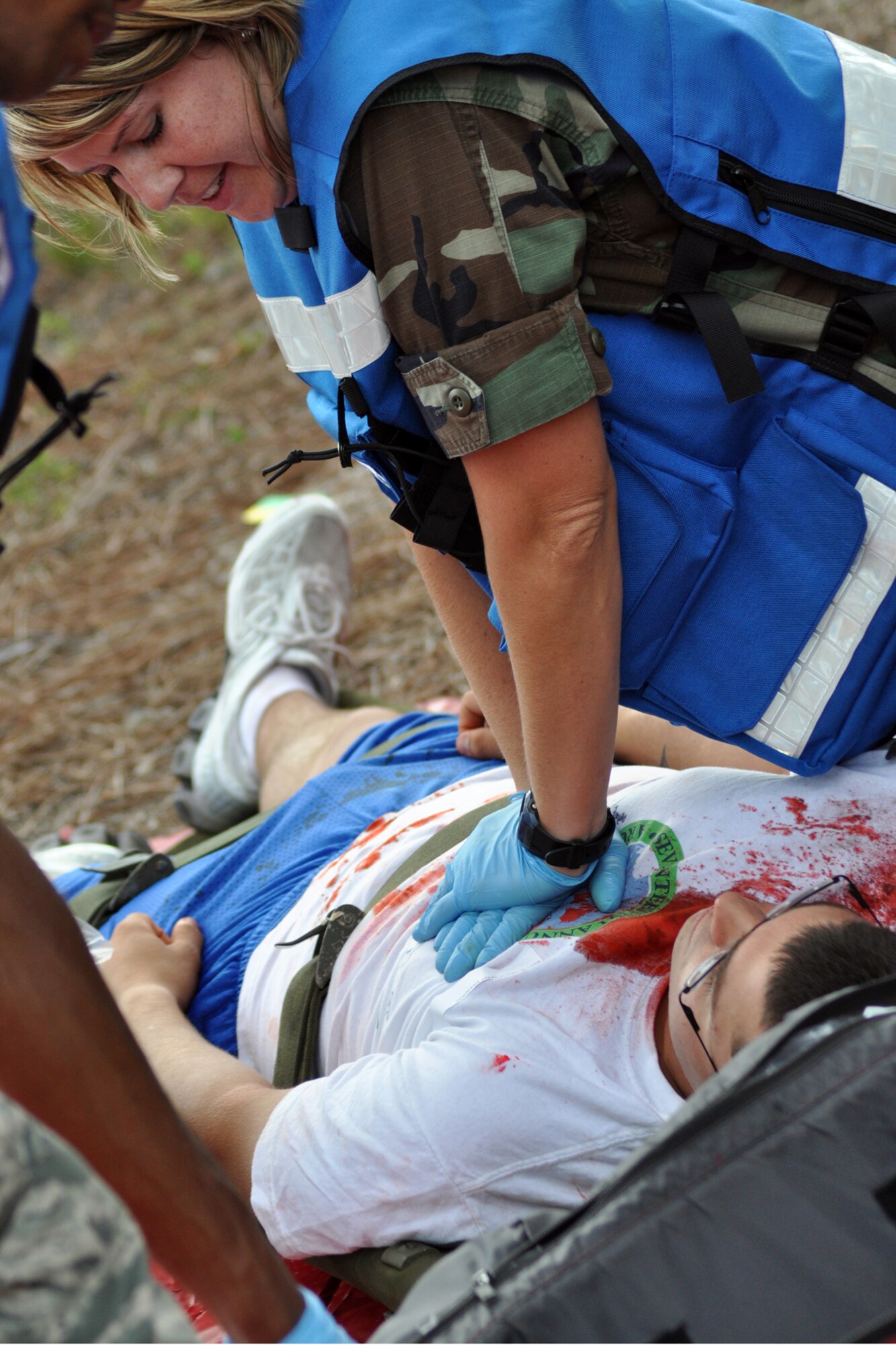 EGLIN AIR FORCE BASE, Fla. – 1st Lt. Mary Perry, 96th Aerospace Medicine Squadron, performs cardiopulmonary resuscitation on a blast injury victim during an exercise here, July 22. The exercise evaluated first responders and medics reaction to real-world crisis scenarios. The simulated explosion injured approximately 40 people and fatally wounded 13. The exercise also evaluated the base’s response to a threat situation with increase Force Protection levels. (U.S. Air Force photo/ Airman Anthony Jennings)