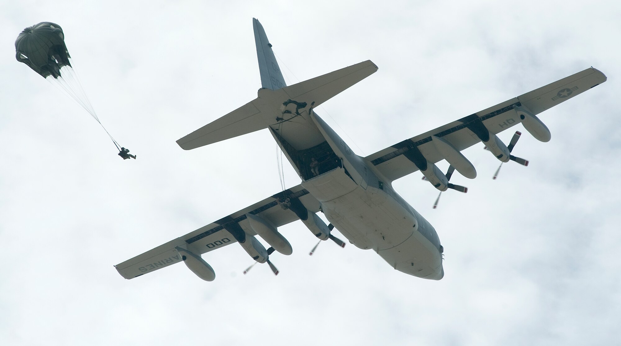 Airmen, Soldiers and Marines conduct joint competency airborne training July 23 over Lackland Air Force Base, Texas. Aircrew and aircraft are from the Marine Aerial Refueler Transport Squadron 234 at Joint Reserve Base/Naval Station Fort  Worth, Texas. (U.S. Air Force photo/Staff Sgt. Bennie J. Davis III)