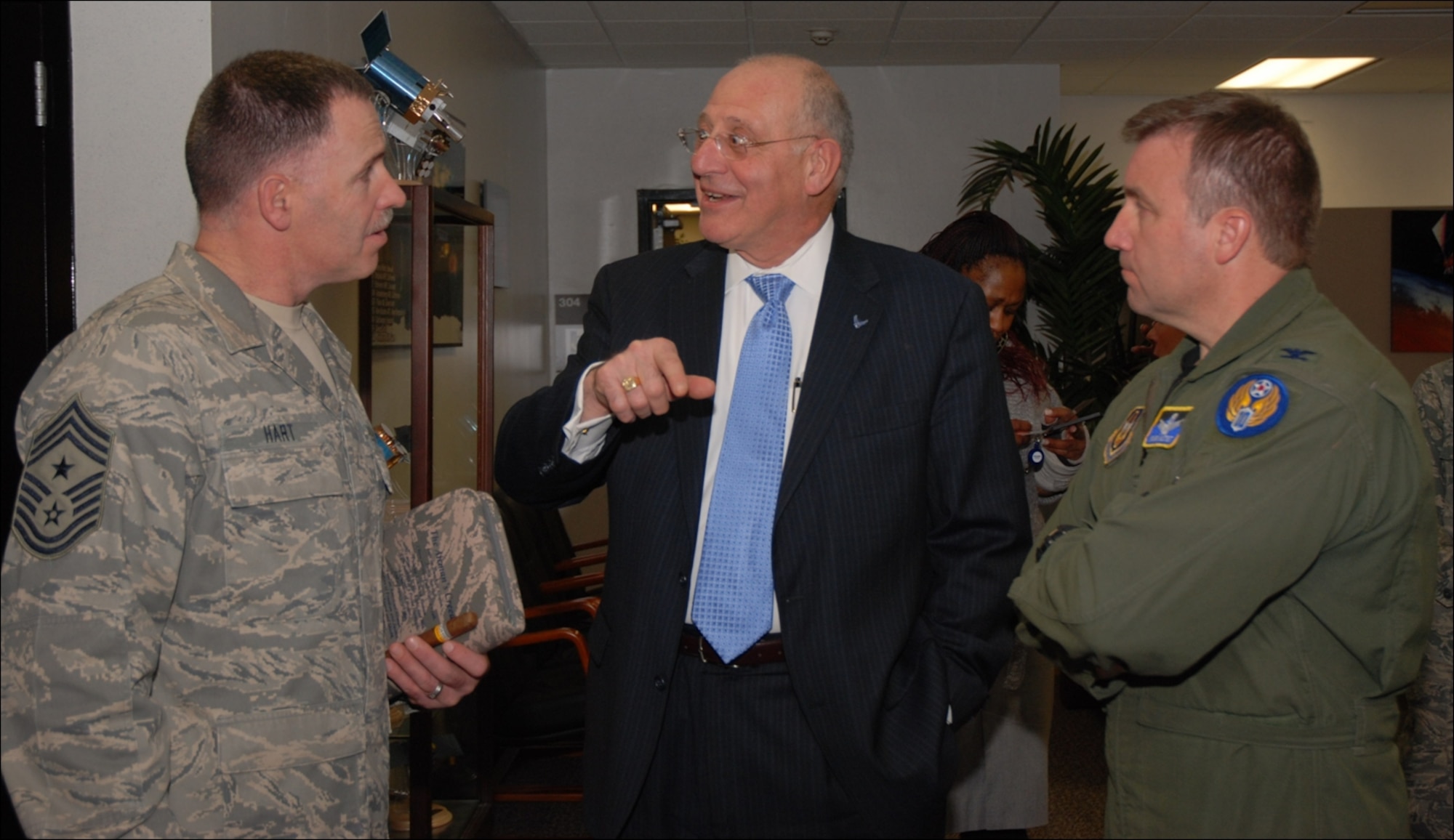 Chief Master Sgt. Rocky V. Hart (310 SW command chief), Mr. Blaise J. Durante (deputy assistant secretary of the Air Force for acquisition integration) and Col. Mark Hustedt (310 SW vice commander) discuss some of Mr. Durante’s observations during his visit with the Air Force Board. (U.S. Air Force photo by Tech. Sgt. Nicholas Ontiveros)
