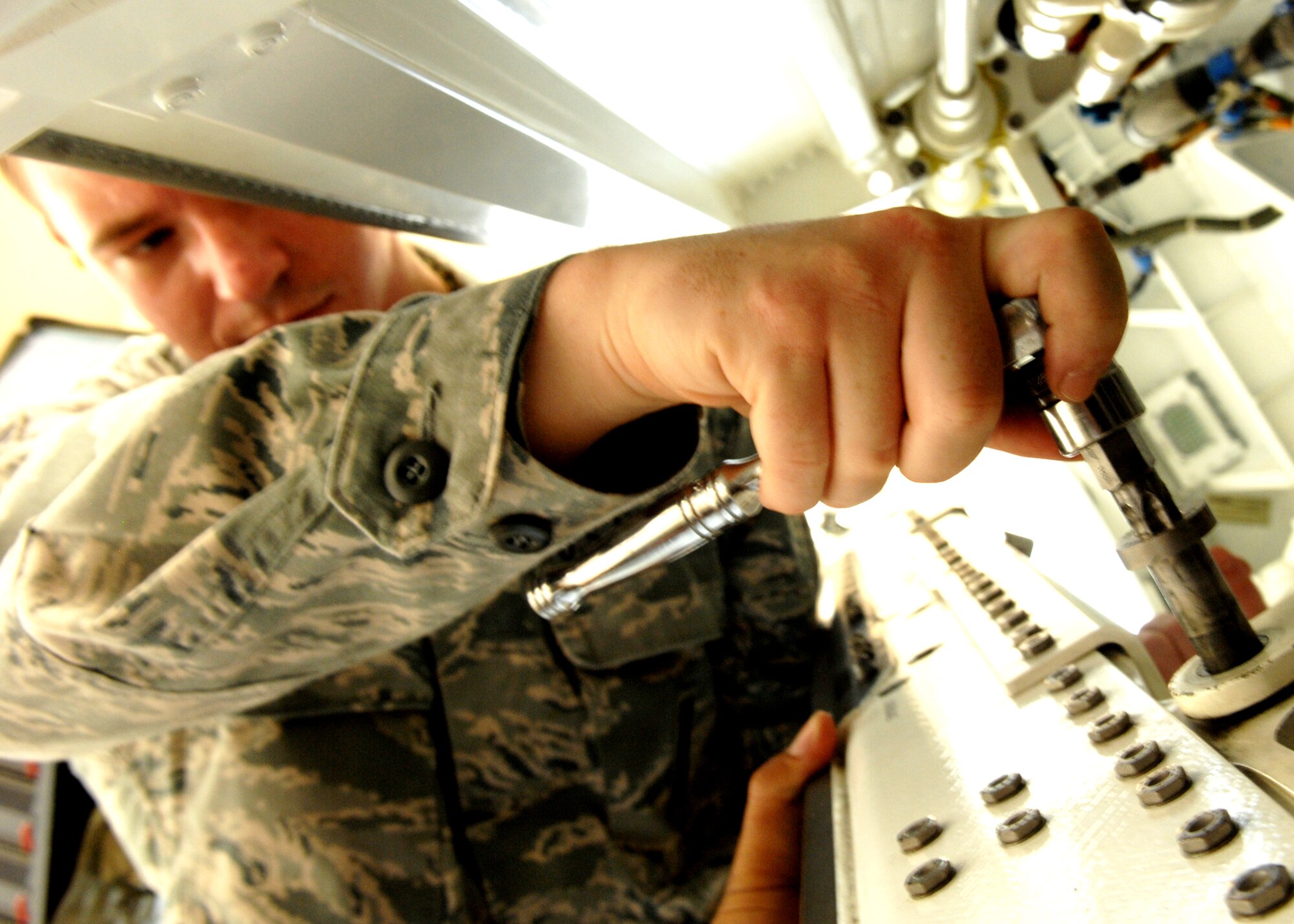 Senior Airman Justin Hall, 49th Maintenance Operations Squadron, performs removal and installation of an LAU-141 CRL (Launcher Unit, Configurable Rail Launcher) which carries the Aim-9 sidewinder on the F-22A Raptor during the
F-22 Armament Weapons Bay Door System and Suspension Components Maintenance Course, July 15, at Holloman Air Force Base, N.M. Students learn how to remove and install weapons equipment, 30 and 90 day prevent maintenance on equipment inspections on aircraft equipment.


 (U.S. Air Force photo/SSgt Anthony Nelson Jr)