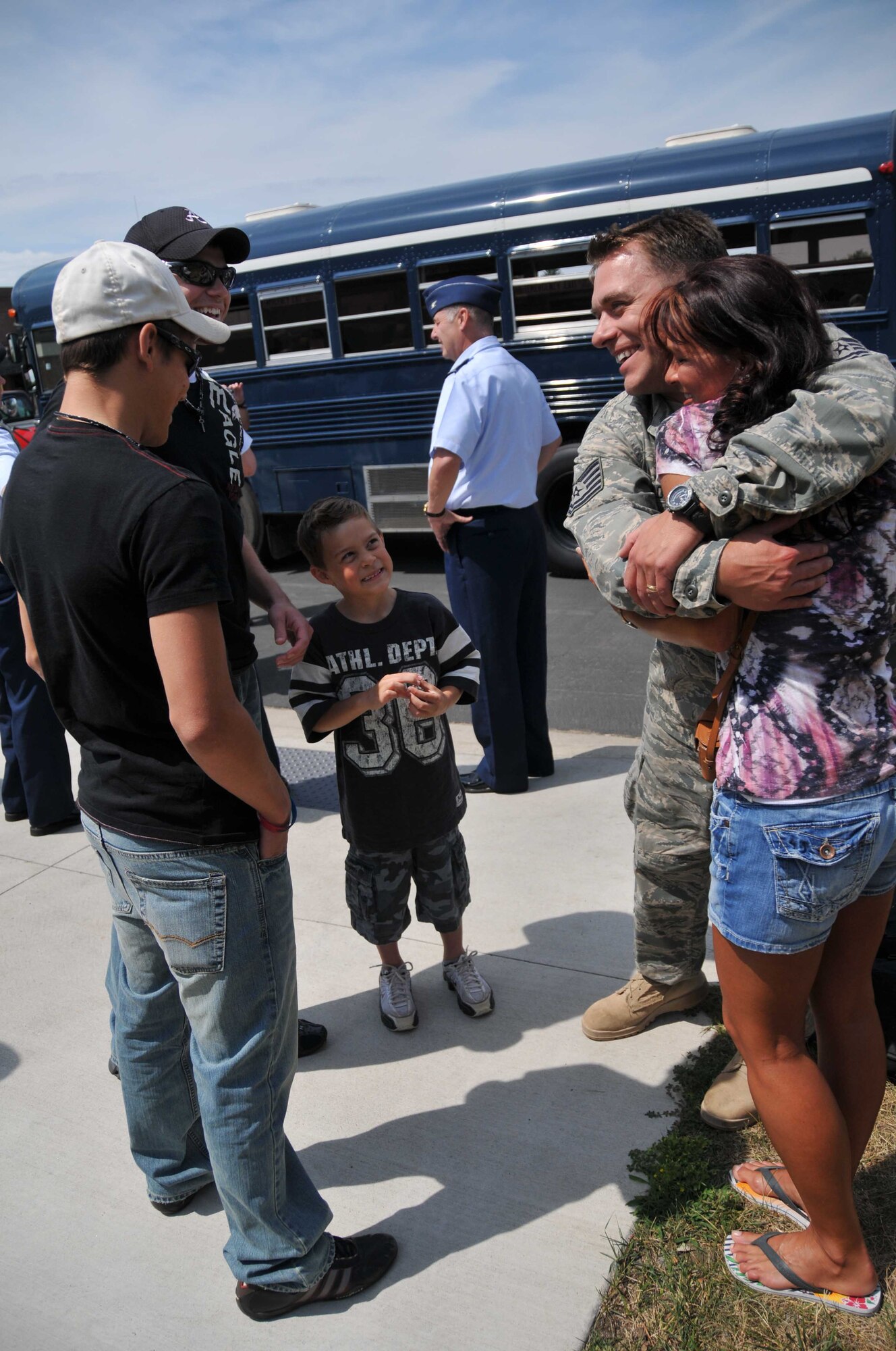 Tech. Sgt. Chan Copas, 934th Security Forces Squadron is welcomed back home by family members today at Minneapolis St. Paul International Airport Air Reserve Station after being deployed to Southwest Asia for more than seven months. (Air Force Photo/Master Sgt. Paul Zadach) 