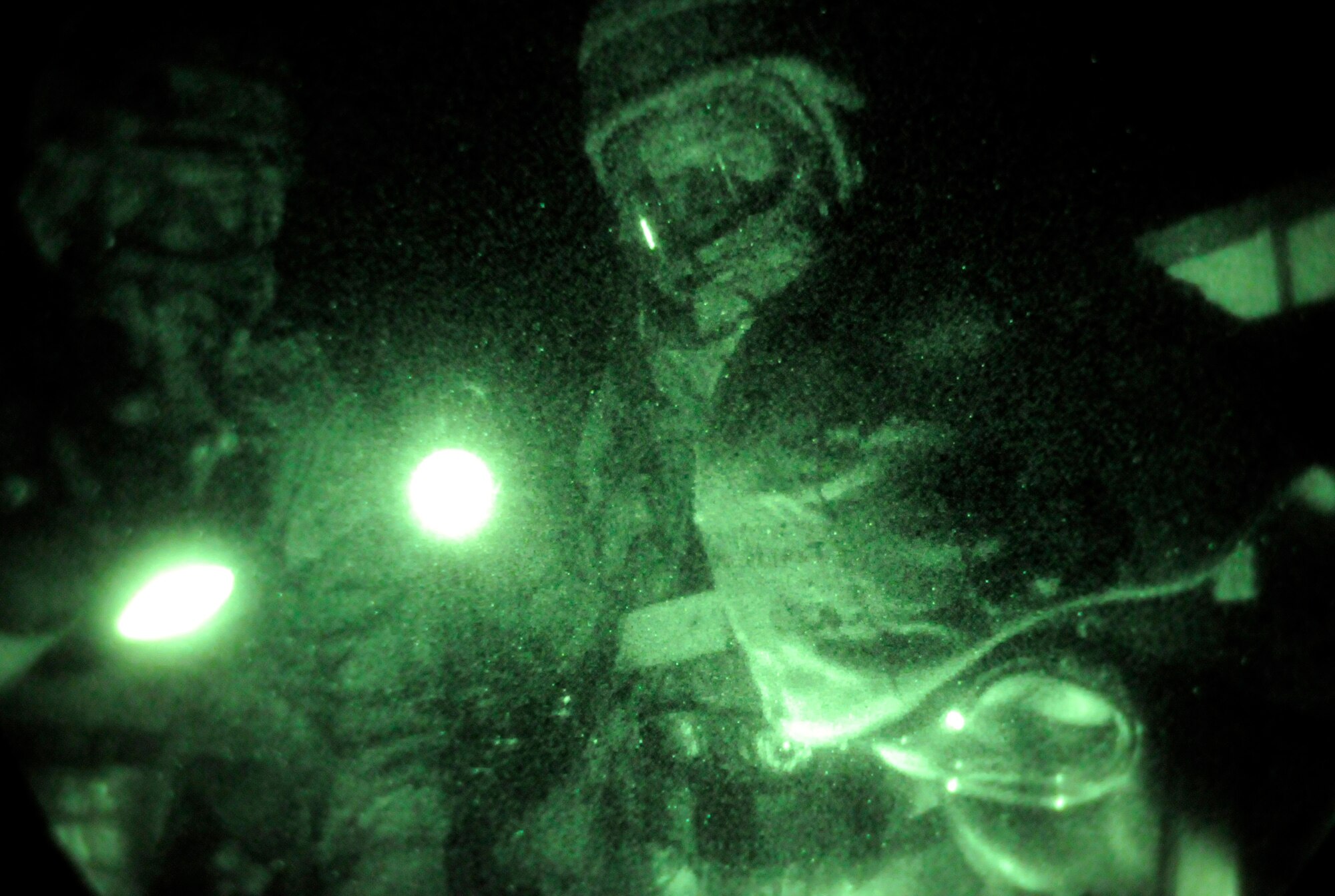 RAF MILDENHALL, England – Post-attack reconnaissance teams check the perimeter of facilities for contamination after a simulated attack during a phase-two exercise July 22.  During phase-two exercises Airmen practice several worst-case scenarios that could happen in a deployed environment including chemical weapons attacks.  (U.S. Air Force photo by Staff Sgt. Christopher L. Ingersoll)