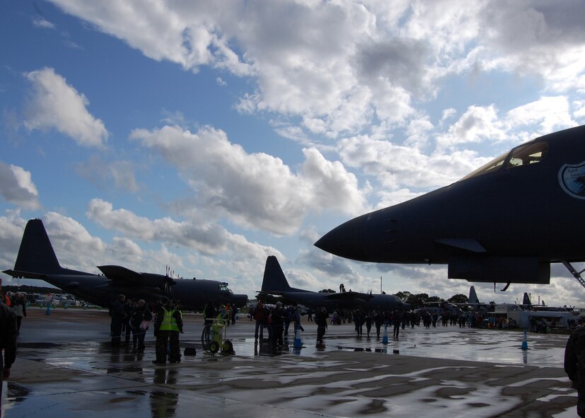 People attending the Royal International Air Tattoo get one last glance of the B-1B, Lancer, after a rainstorm on the last day of the air show here July 19. The air show was open to the public for July 18 and 19. The B-1 crew stayed busy giving tours of the static display and answering questions from the spectators. (U.S. Air Force photo by Senior Airman Jennifer Romig)