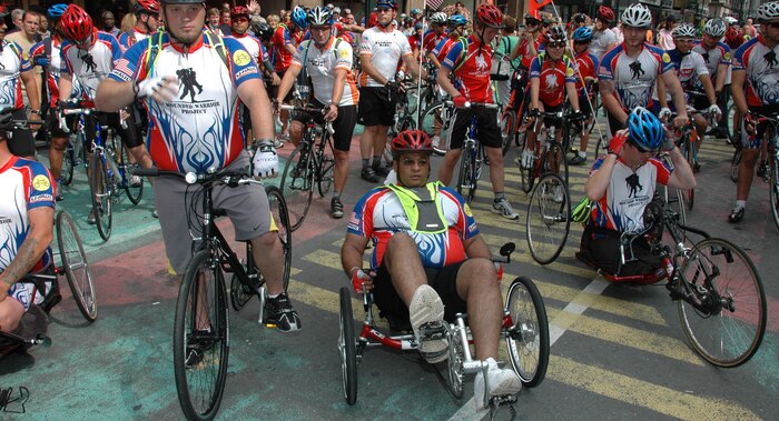 Injured service members wait at the starting point for Wounded Warrior Project Soldier Ride, New York City, July 23. The bicycle ride through Manhattan is part of the organization’s goal to raise awareness for those who have been injured while fighting overseas. (Marine Corps photo by Sgt. Randall A. Clinton)