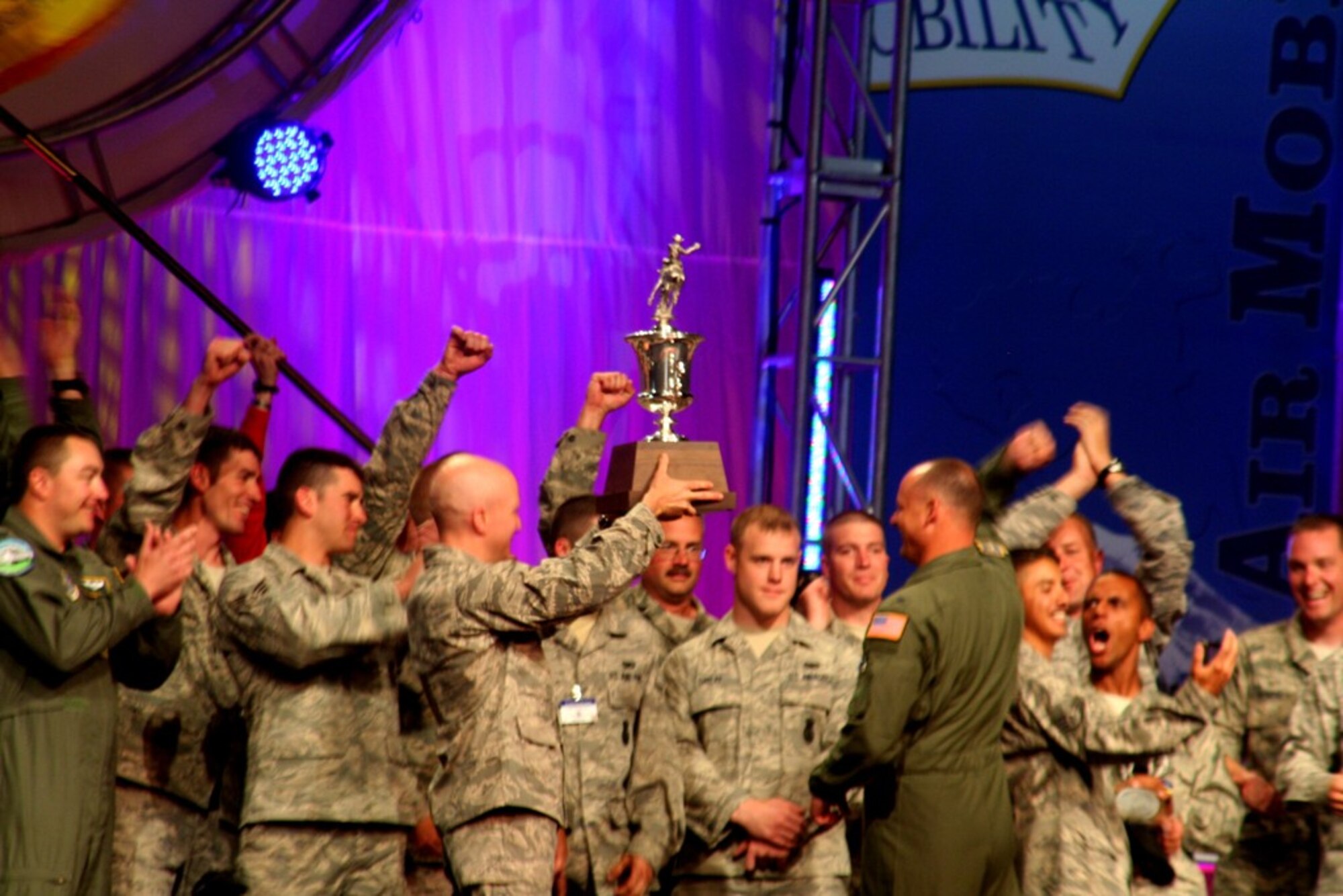 Members of the 62nd Airlift Wing, McChord Air Force Base, Wash., hold up the trophy for winning Best Air Mobility Team for Air Mobility RODEO 2009 July 24, 2009, at McChord AFB. The award is considered the "Best of the Best" in RODEO competition.  (U.S. Air Force Photo/Tech. Sgt. Scott T. Sturkol)