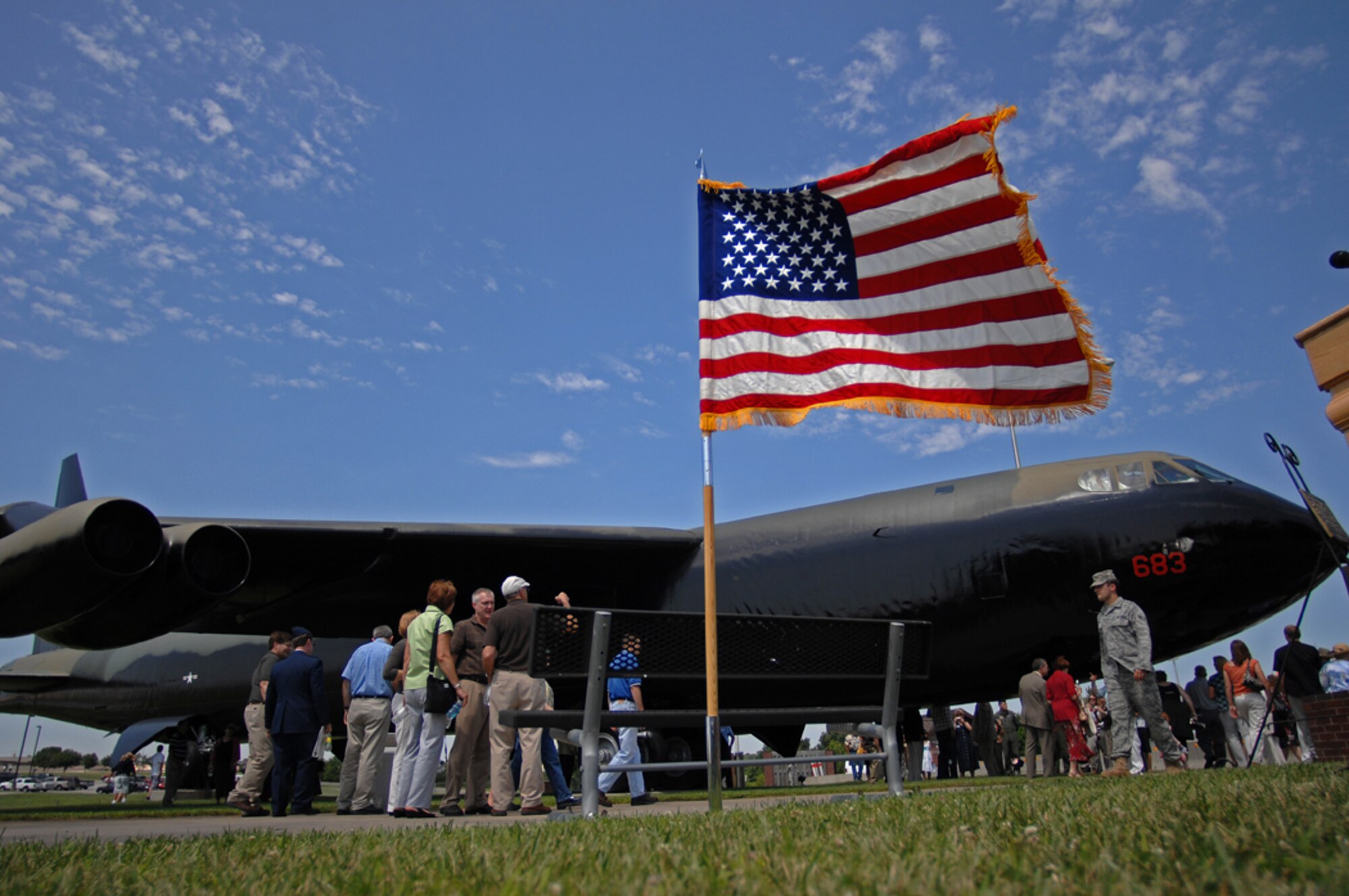 WHITEMAN AIR FORCE BASE, Mo. - Family members, retired military personnel, and active duty members mingle July 24 after a B-52 static display ceremony which was dedicated to Capt. Robert Morris Jr. and the crew of Ebony-02 who flew during Operation Linebacker II during the Vietnam War. Many veterans associations were in attendance Friday as well as members of Team Whiteman. (U.S. Air Force photo/Senior Airman Kenny Holston)