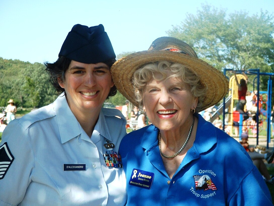July 5, 2009:  MSgt Elaine D'Alessandro poses with Ms. Joanne Patton, daughter-in-law of WWII General George S. Patton, Jr, and wife of Vietnam War Major General George S. Patton, IV in Patton Park, Hamilton, MA, prior to a late afternoon band concert.  MSgt D'Alessandro met with Ms. Patton and the two looked at photos of MSgt D'Alessandro's father being decorated by General Patton during WWII.