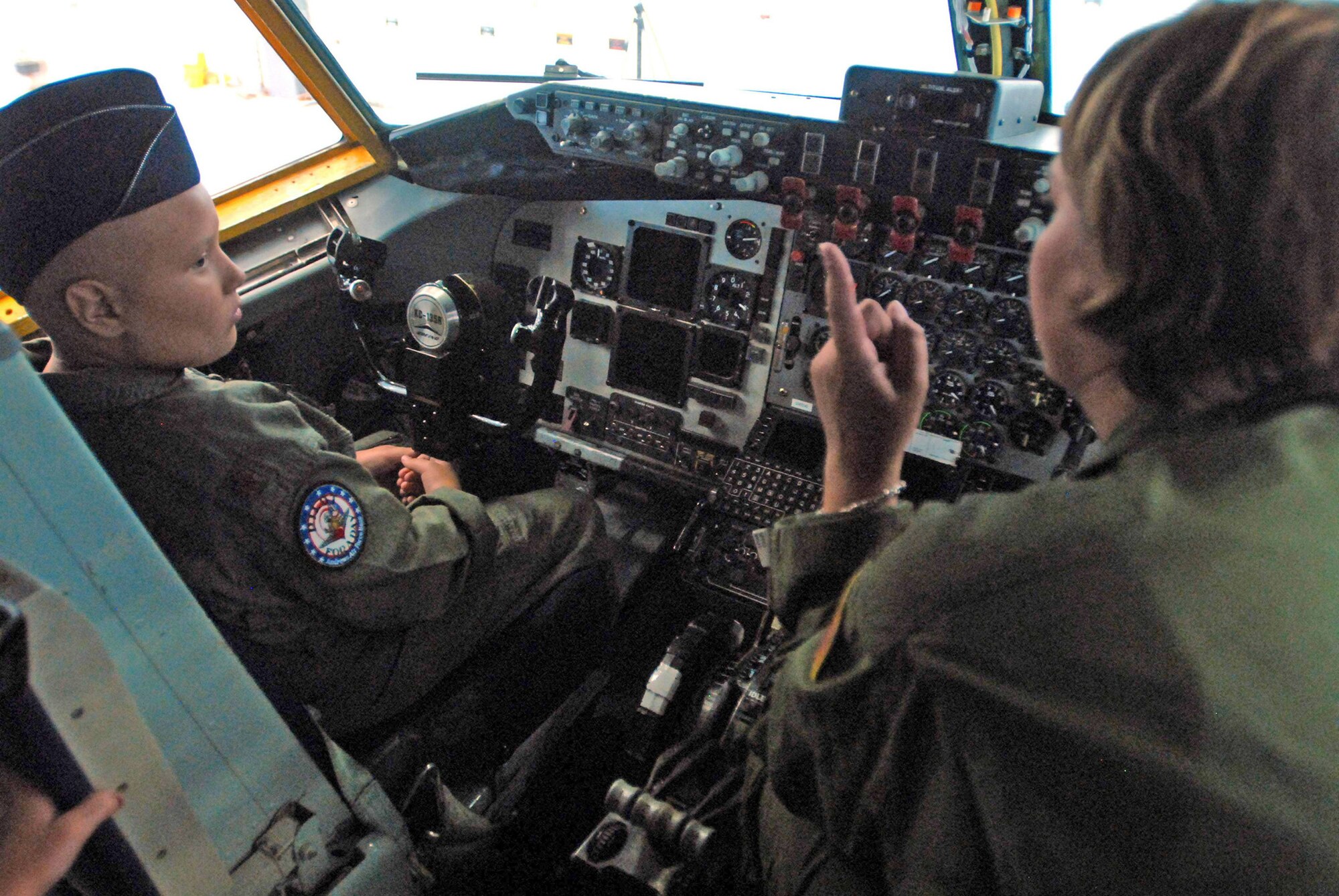 Kayla Kiley learns about the KC-135 Stratotanker while sitting in the cockpit during the Pilot for a Day Program July 23 at Andrews Air Force Base, Md. Kiley is currently battling cancer. (U.S. Army photo/Sgt. 1st Class Jon Soucy)