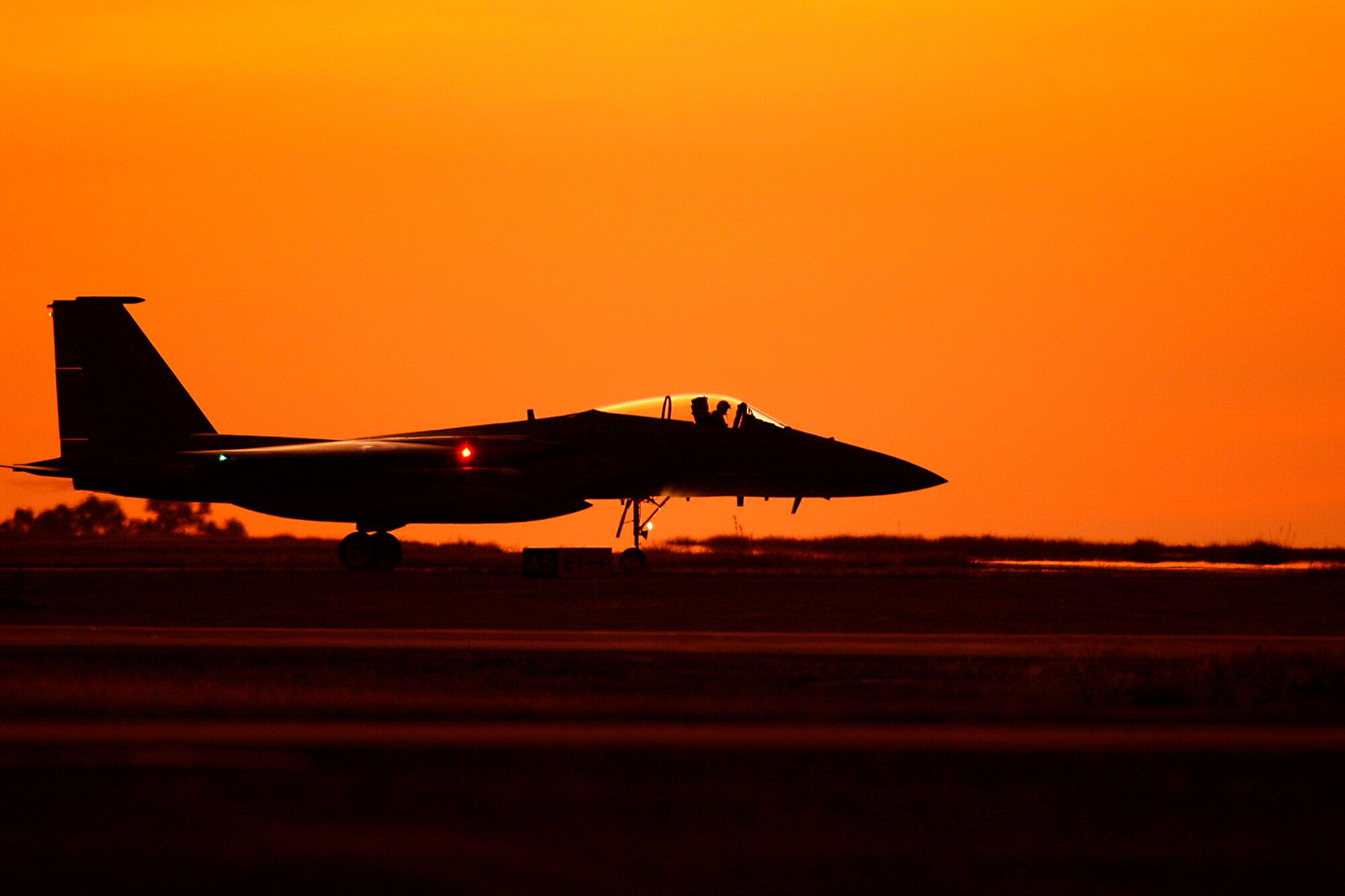 An F-15 Eagle from Kadena Air Base, Japan, taxis to the runway for a night-time sortie at Royal Australian Air Force Base Darwin July 14 as part of Exercise Talisman Saber 2009.  The biannual, joint and coalition exercise, which began July 13, saw U.S. and Australian forces working together to improve interoperability.  The exercise ends July 25.  (Royal Australian Air Force photo/CPL Melina Mancuso) 