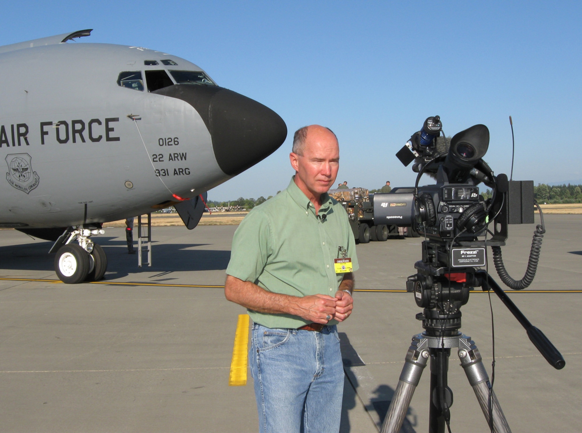 Chris Frank, KAKE 10 news reporter, records a report at McChord Air Force Base, Wash., about Team McConnell's participation in RODEO 2009. Mr. Frank's daily reports of the week-long competition include interviews with Reservists from the 931st Air Refueling Wing and can be seen at KAKE's Web site. (U.S. Air Force photo/Tech. Sgt. Chyrece Campbell)