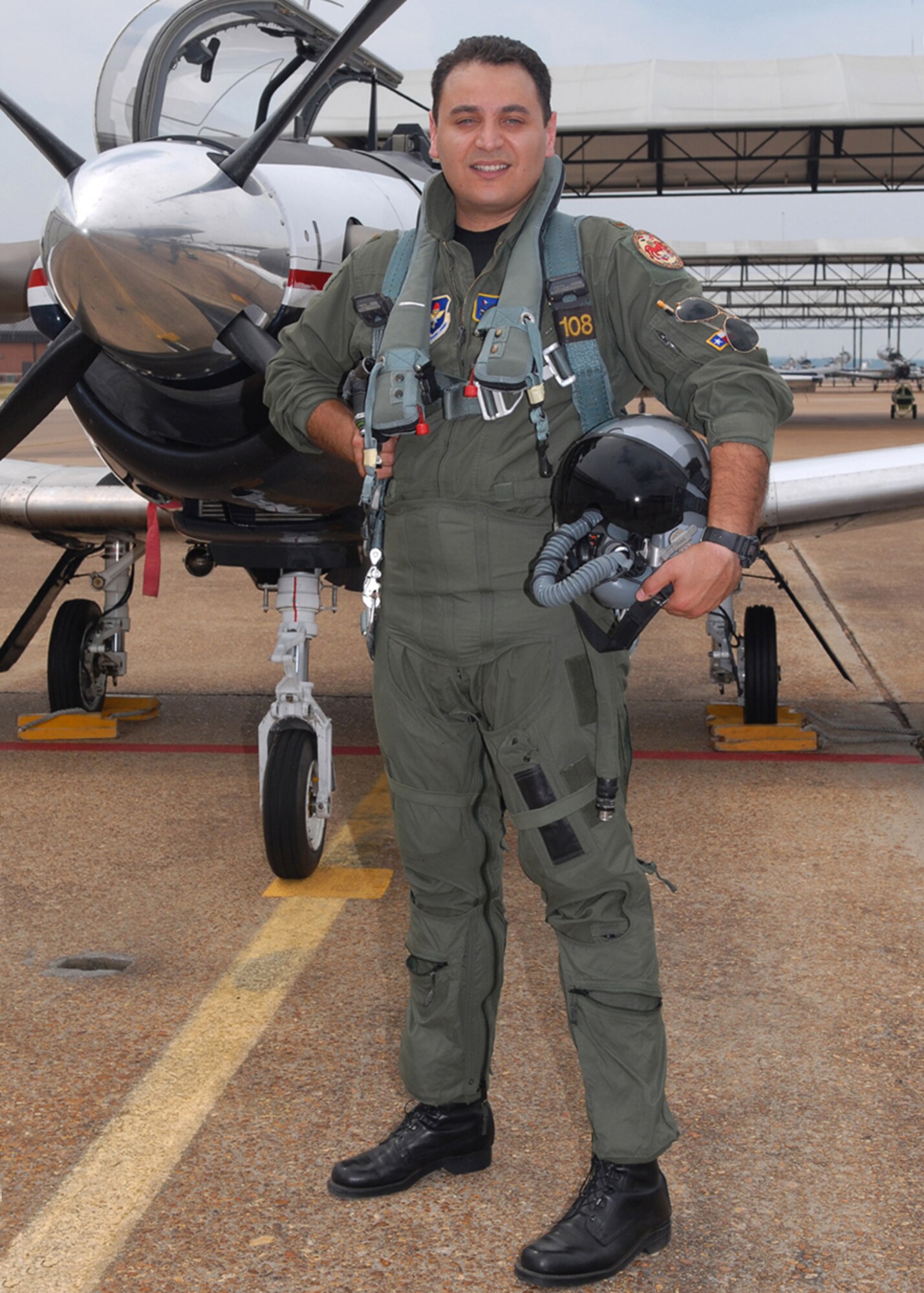 Second Lt. Omar AlNuaimi, Iraqi air force, graduated July 24 alongside his fellow student pilots in Specialized Undergraduate Pilot Training Class 09-12 at the Kaye Auditorium at Columbus Air Force Base. (U.S. Air Force photo)
