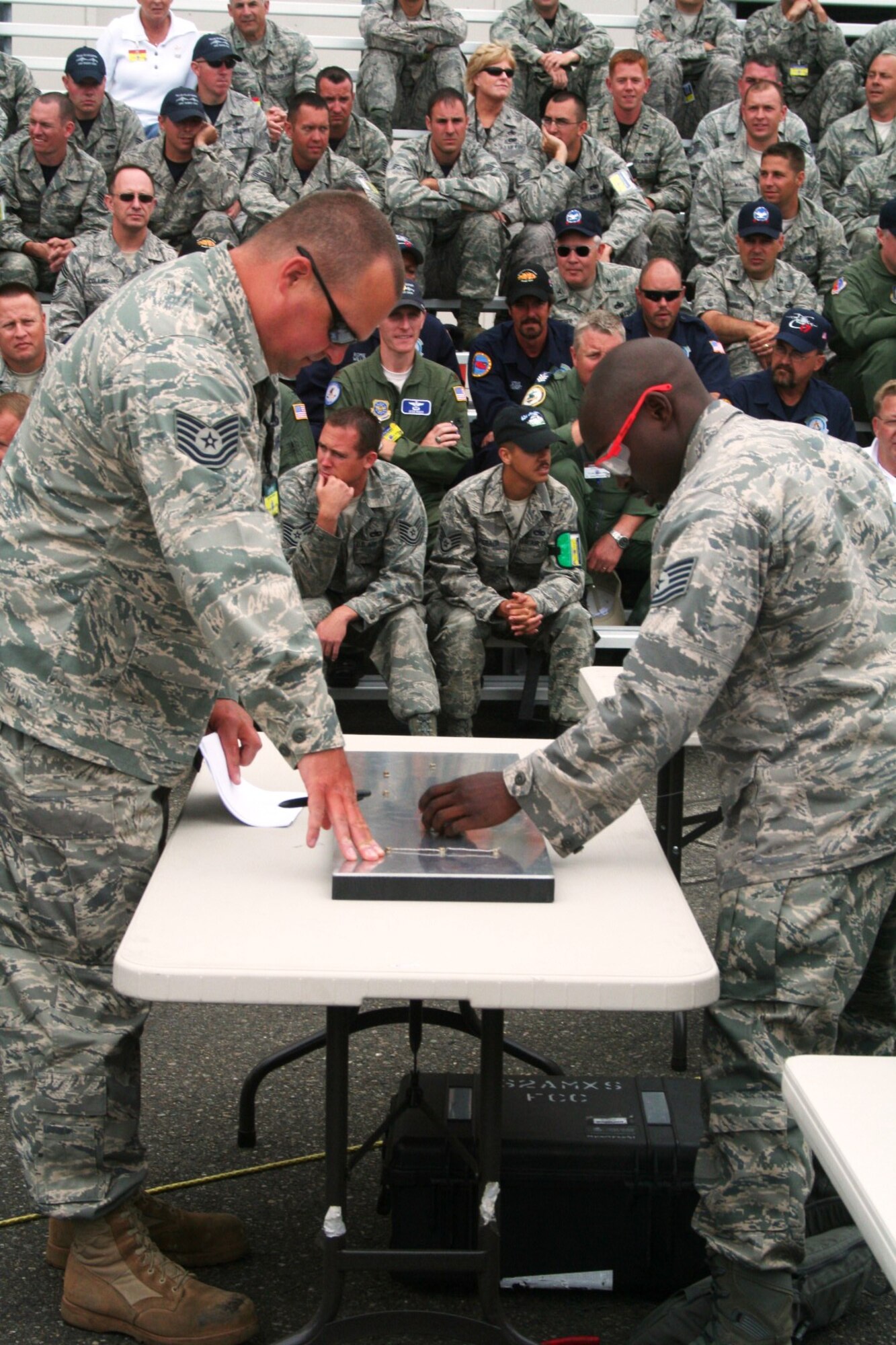 Maintenance Airmen participate in a maintenance skills competition demonstration July 23, 2009, as part of activities for Air Mobility RODEO 2009 at McChord Air Force Base, Wash. The maintenance skills competition will be featured for the first time as a main event in RODEO 2011.  (U.S. Air Force Photo/Tech. Sgt. Scott T. Sturkol)