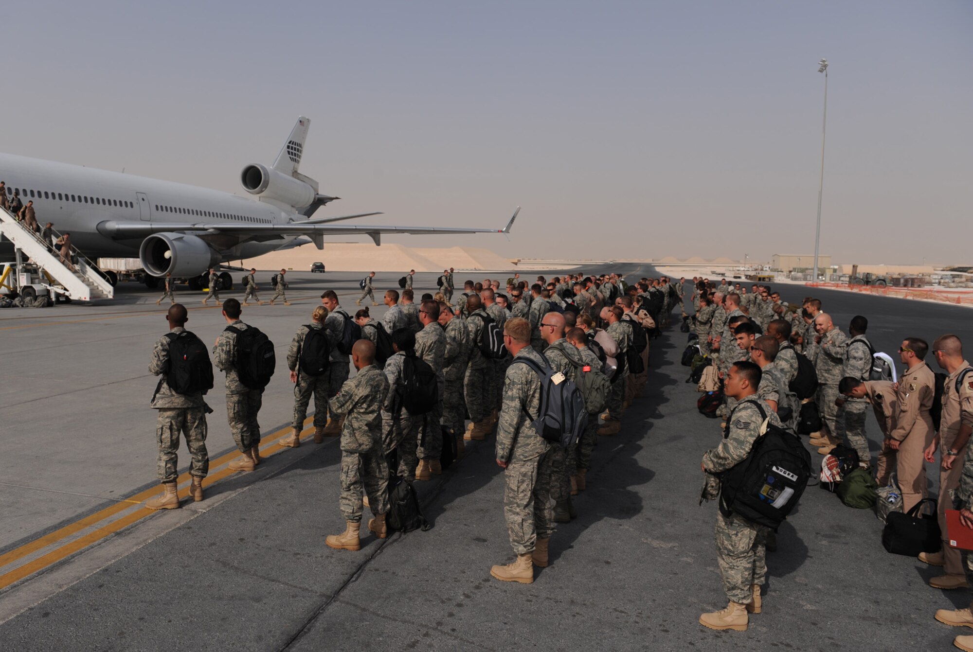 Servicemembers from Ellsworth Air Force Base arrive at their deployed location in Southwest Asia. Members were deployed to the 379th Air Expeditionary Wing in various roles supporting Operations Iraqi and Enduring Freedom. (U.S. Air Force Photo/Staff Sgt. Robert Barney)