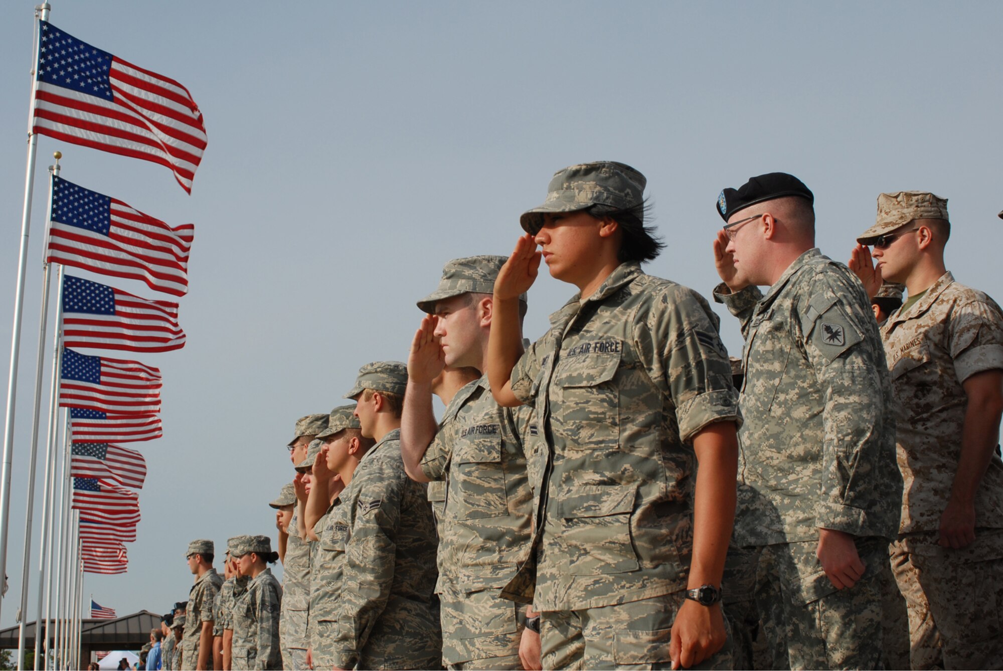 Team Goodfellow servicemembers salute during the playing of the national anthem at the 17th Training Wing change of command ceremony, July 22. Col. Thomas Geary assumed command from Col. Richard Ayres. (U.S. Air Force photo by Staff Sgt. Laura R. McFarlane) 