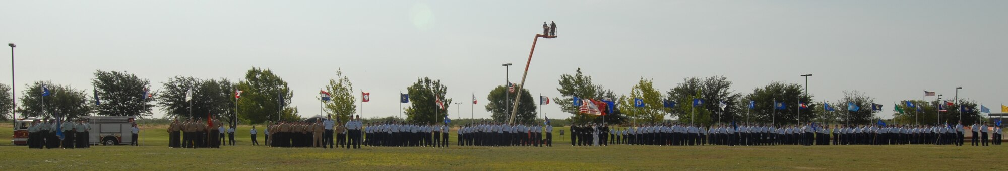 Soldiers, Sailors, Marines and Airmen stand in formation during the change of command ceremony. (U.S. Air Force photo by Staff Sgt. Laura R. McFarlane) 
