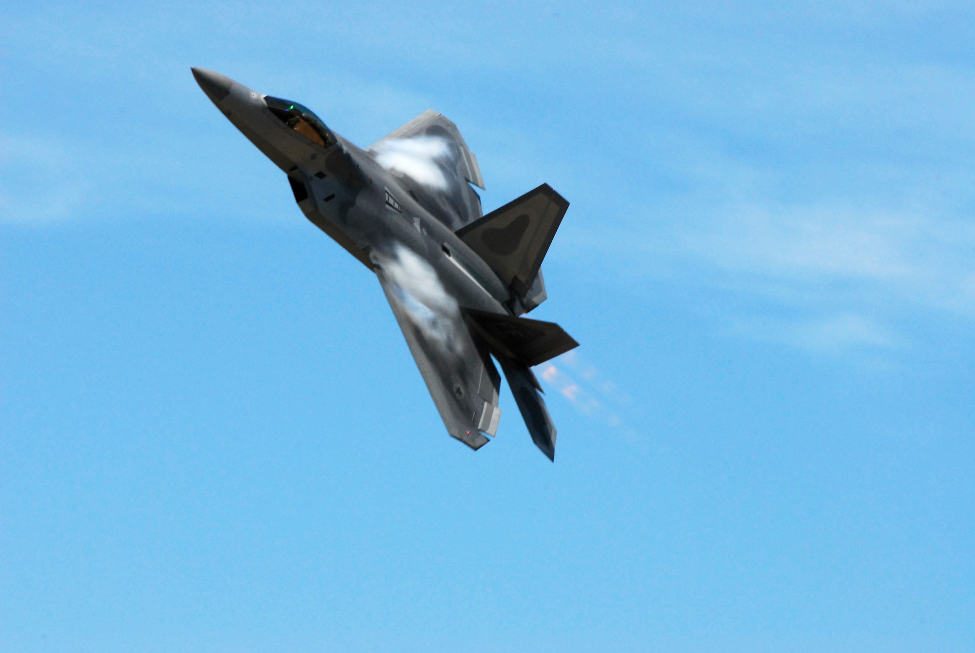 SIOUX FALLS, S.D. -- One of two F-22 Raptors from the United States Air Force F-22 Raptor demonstration team maneuvers for a smooth landing at Joe Foss Field here during their arrival July 23 in support of the Sioux Falls Airshow. (U.S. Air Force photo by Staff Sgt. Quinton Young)
