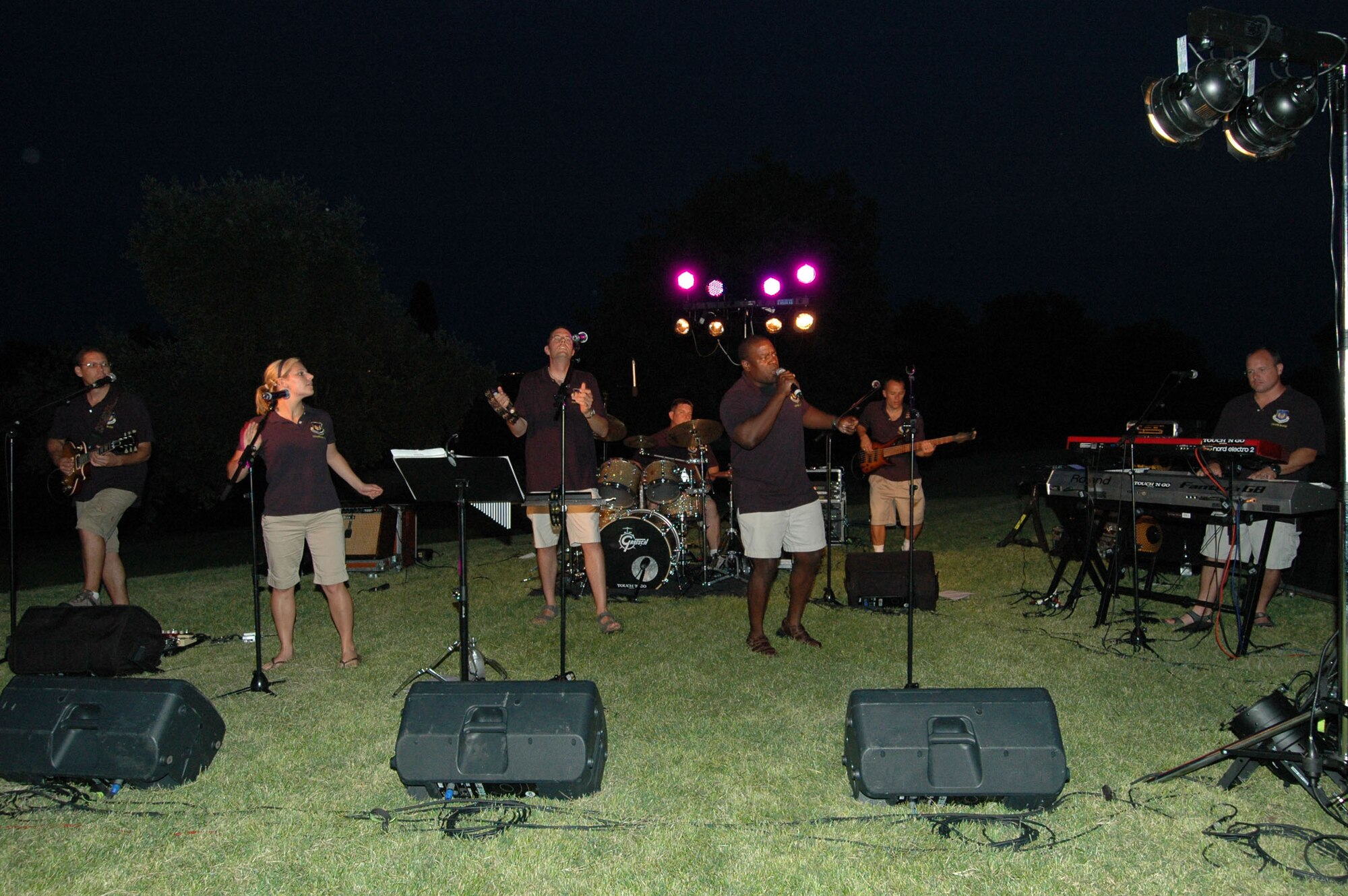 The U.S. Air Forces in Europe Touch 'n Go Band entertains members of the Aviano, Italy, community at Castello d'Aviano July 23, 2009. (U.S. Air Force photo/Staff Sgt. Mercedes Crossland)