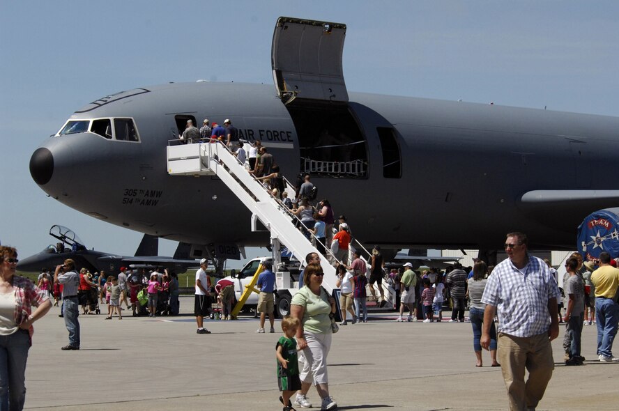 MINOT AIR FORCE BASE, N.D. -- Spectators from all around local community enters the flight line during the 2009 Northern Neighbors Day festivities here July 18. Thousands of people from the base and local community turned out to watch the 2009 Northern Neighbors Day, which came through on its promise to wow spectators with amazing aerial maneuvers, nail-biting choreography, historic displays and much more. (U.S. Air Force Photo by Airman First Class Jesse Lopez)