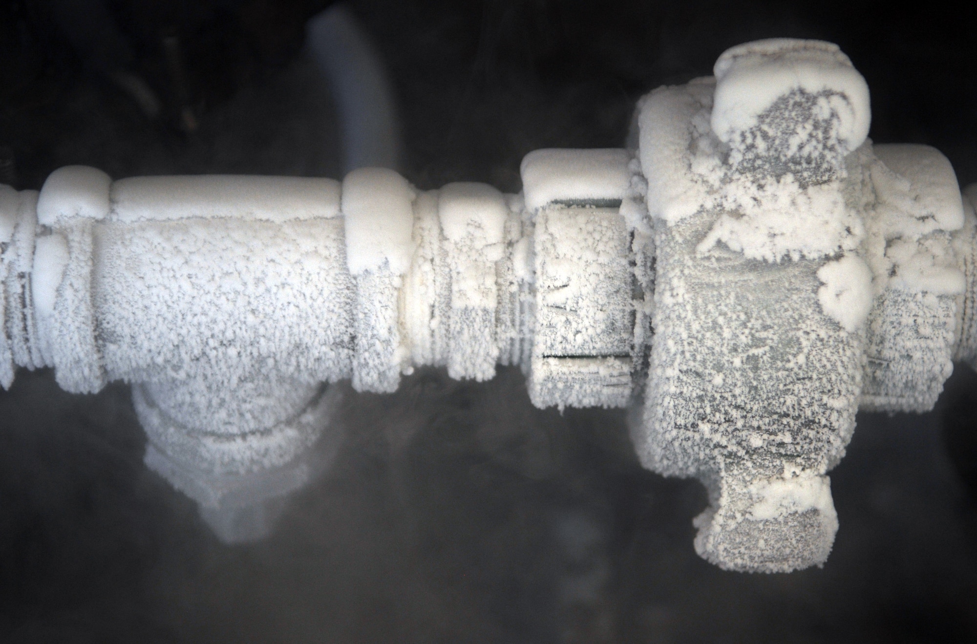 Pipes connected to a liquid oxygen, or LOX, holding tank defrosts after transferring LOX Thursday, July 23, 2009 at Incirlik Air Base, Turkey. 39th Logistics Readiness Squadron fuels management technicians, or “Brew Crew” members, are in charge of LOX and ensures it meets standards for it to be used in aircraft oxygen systems. When exposed to the open air, the minus 297 degree LOX evaporates into a gas. (U.S. Air Force photo/Senior Airman Alex Martinez)
