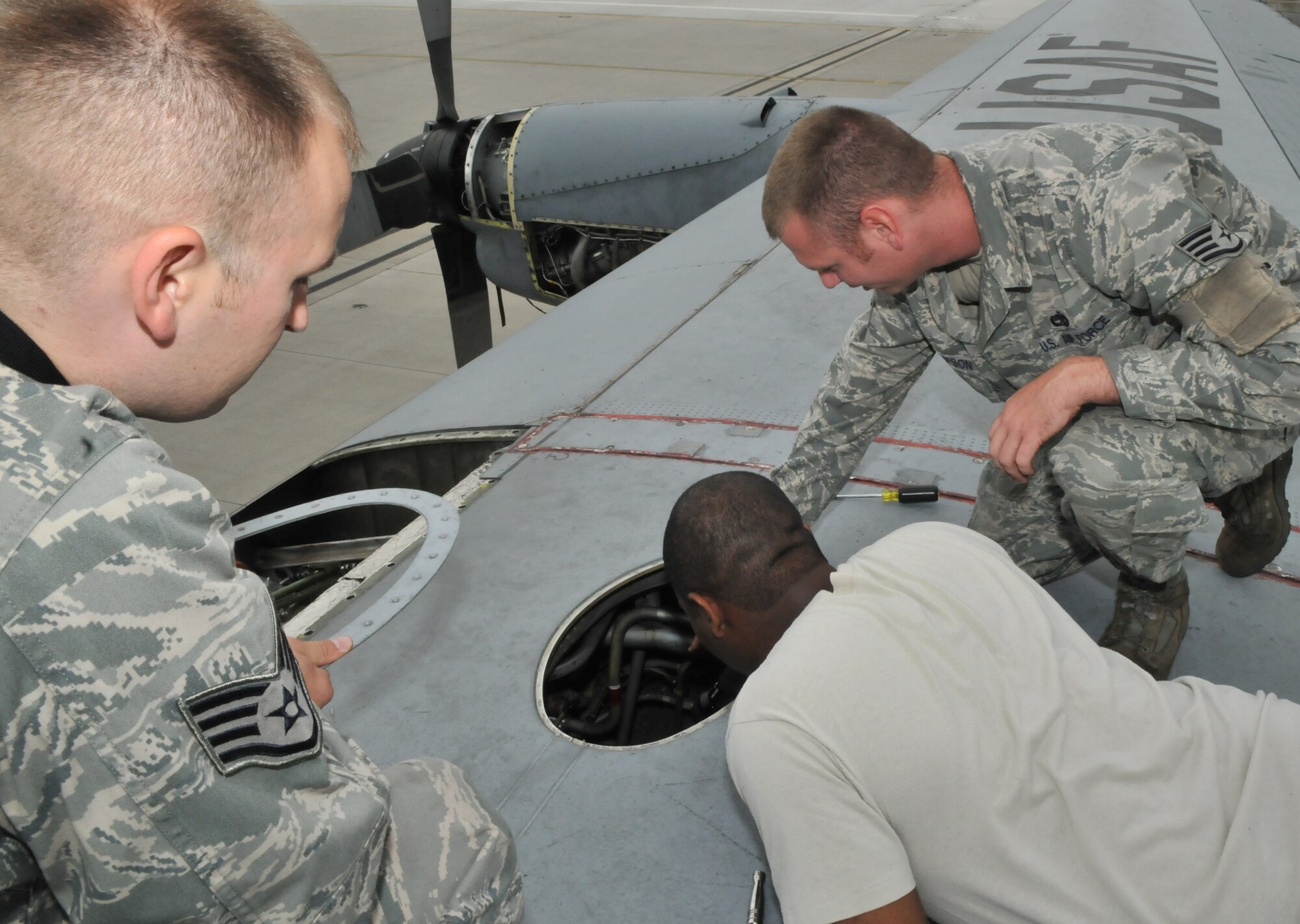 U.S. Air Force aircraft maintainers from the 86th Maintenance Squadron perform an isochronical inspection on a C-130E Hercules, July 22, 2009, Ramstein Air Base, Germany. This is the final ISO inspection on the C-130E Hercules on Ramstein as the base continues to replace the C-130E with the new C-130J Super Hercules. (U.S. Air Force photo by Senior Airman Nathan Lipscomb)