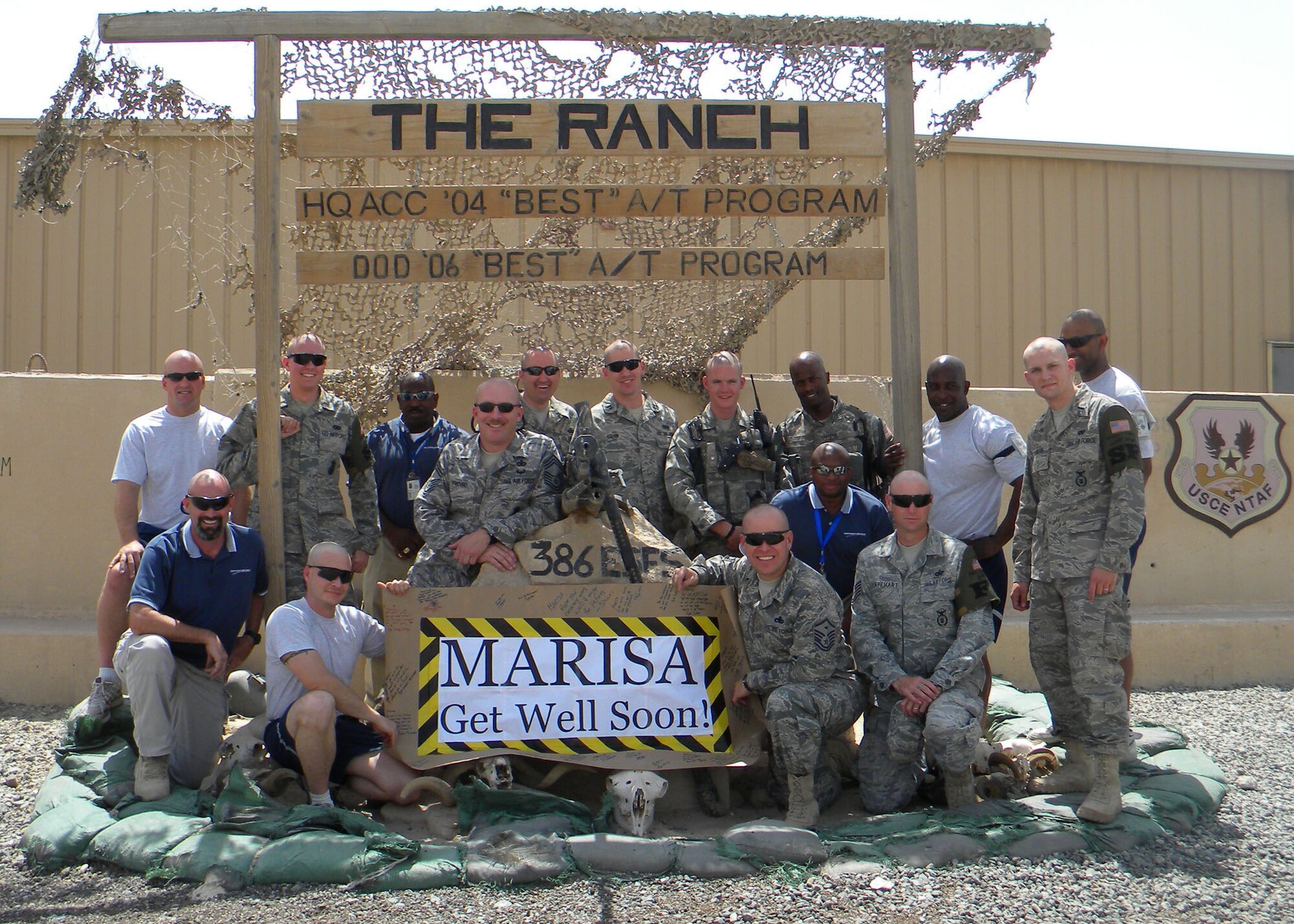 Members of the 386 Expeditionary Security Forces Squadron pose for a photo to show off their freshly shaved heads. As a show of support, the group plans to send the photo to young girl in San Antonio, Texas, who is currently battling cancer. (Courtesy photo/U.S. Air Force)