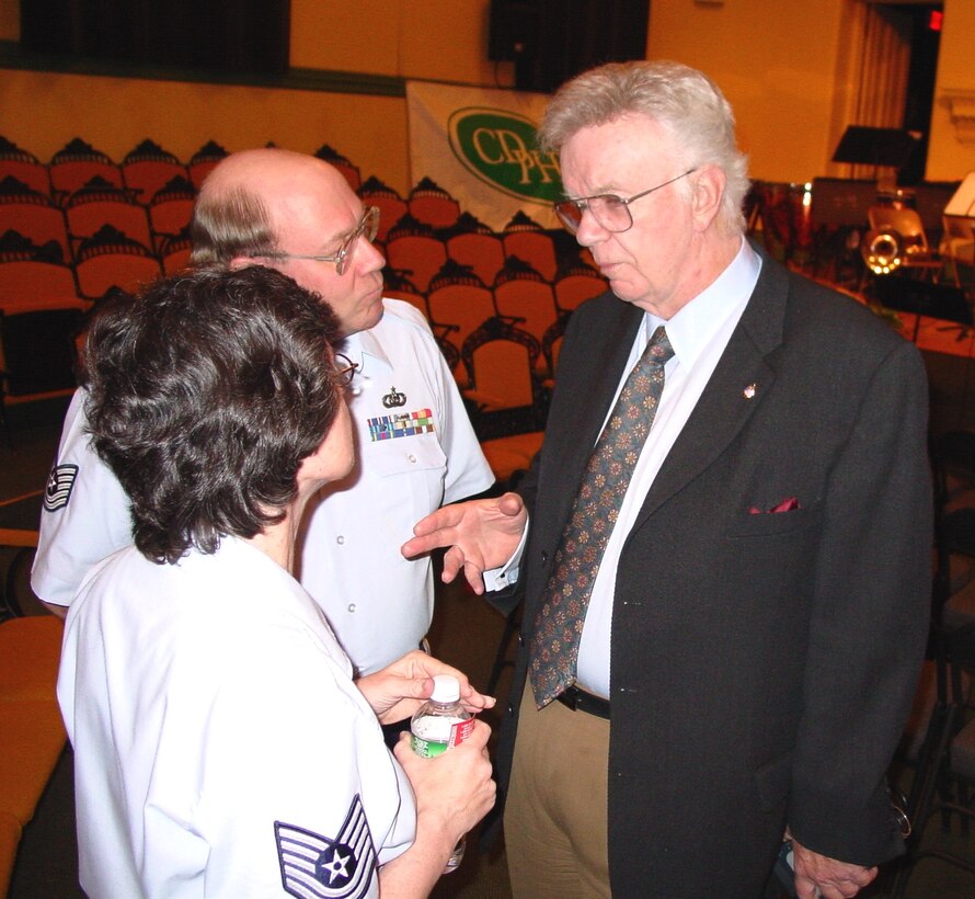 May 31, 2003:  TSgts Ann Donahue and Paul Peterson chat with Dick Robinson, host of "American Standards by the Sea" radio program.  Mr. Robinson was in Poughkeepsie, NY to see the band play during the Mid-Hudson Balloon Festival.  This was TSgt Peterson's last performance before retiring with over 30 years of service.