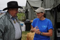SEYMOUR JOHNSON AIR FORCE BASE, N.C. -- Master Sgt. Wendy Lopedote, 916th Security Forces, talks to Medal of Honor recipient Col. (ret.) Joe Jackson at the 916th hospitality tent at RODEO 2009. Colonel Jackson earned the MOH for heroic actions as a C-123 pilot in Vietnam. Sergeant Lopedote went as an observer. (U.S. Air Force photo/TSgt. Scotty Sweatt, 916ARW/PA)