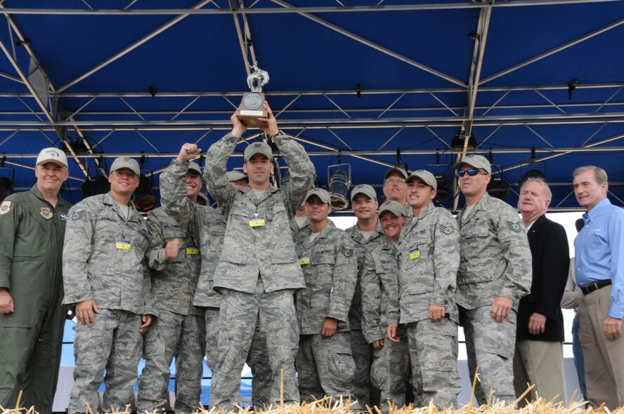 SEYMOUR JOHNSON AIR FORCE BASE, N.C. -- 916th Air Refueling Wing maintainers celebrate with the trophy for Best Post Flight Team at RODEO 2009. (U.S. Air Force photo/TSgt. Scotty Sweatt, 916ARW/PA)