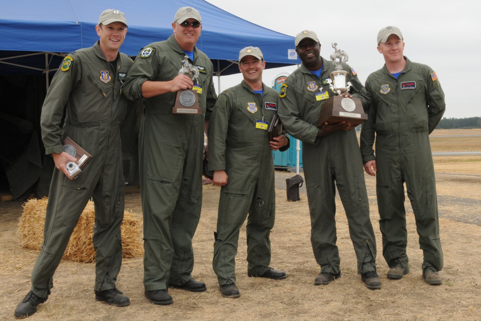 SEYMOUR JOHNSON AIR FORCE BASE, N.C. -- Members of the 916th RODEO team show off their trophies for Best KC-135 Aircrew and Best Cargo Load. (U.S. Air Force photo/TSgt. Scotty Sweatt, 916ARW/PA)