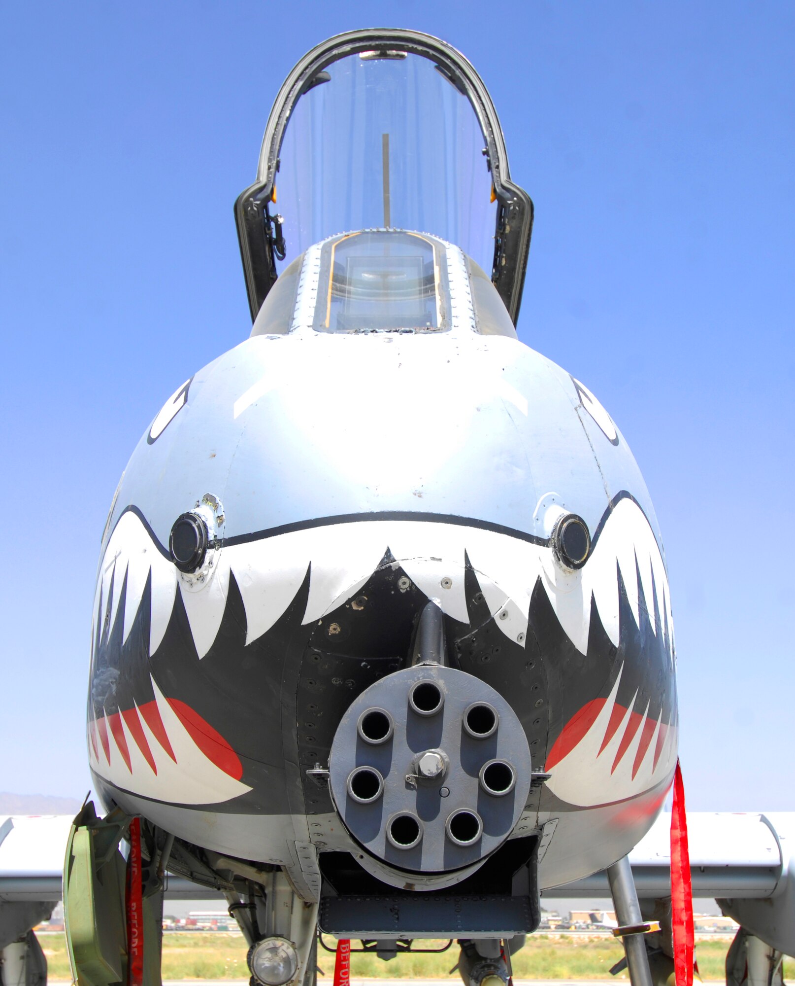 BAGRAM AIRFIELD, Afghanistan – The Airmen who fly, maintain and support the ‘Warthog’ strive to uphold the proud heritage of the unit, which traces its roots to the American Volunteer Group, better known as the ‘Flying Tigers’ of WWII. The Warthog, like the P-40 Warhawk of WWII, still sports the iconic gaping smile of a shark’s mouth. Within that smile rests the GAU-8, 30-mm Gatling gun, capable of unleashing a torrent of high explosive rounds. (U.S. Air Force photo/Tech. Sgt. John Jung)