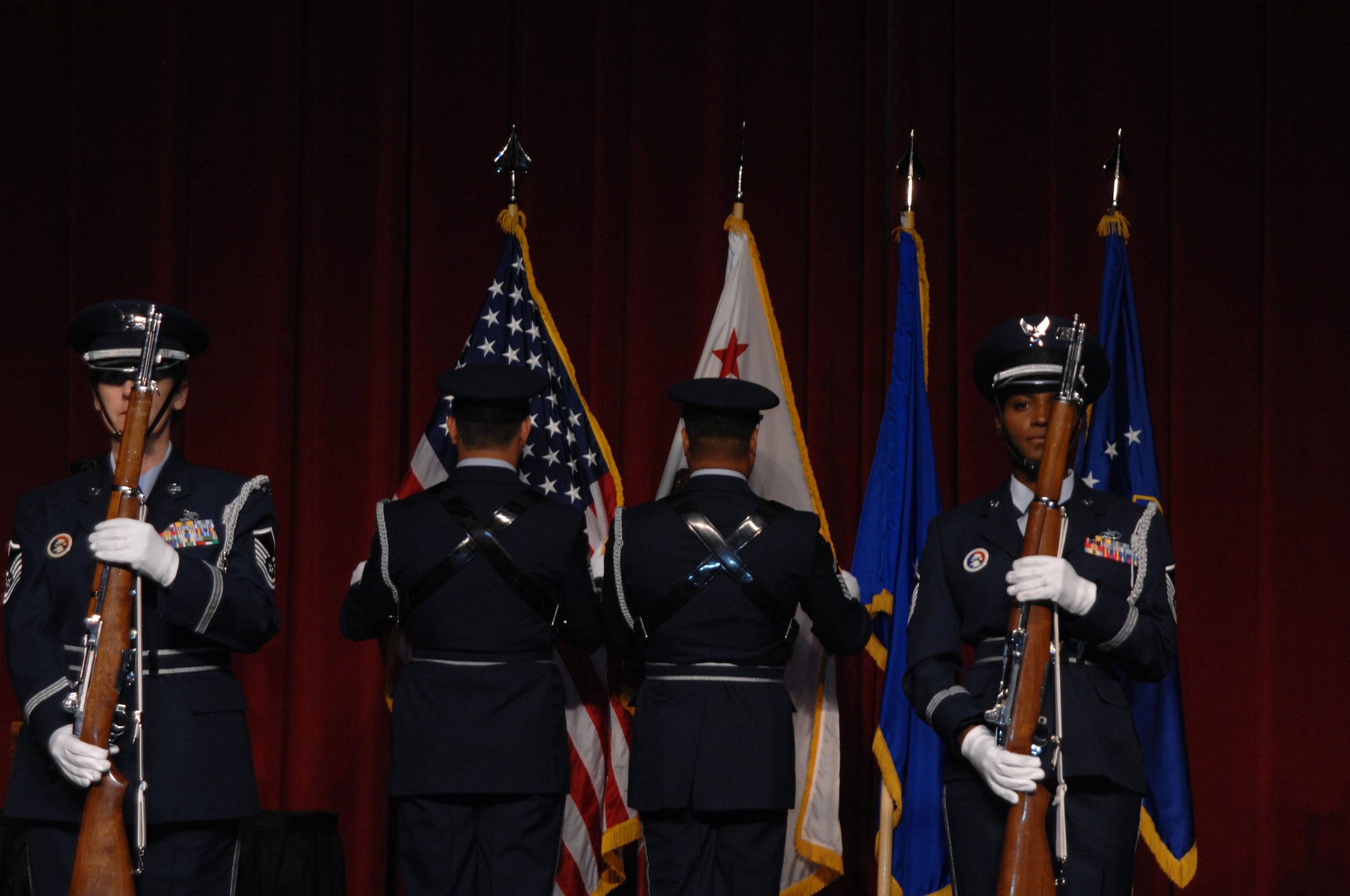 The Fourth Air Force Color Guard posts the Colors during the 11th Annual Raincross Trophy Dinner held July 23, 2009, at the Riverside Convention Center, Riverside, Calif.. The dinner is hosted by the Greater Riverside Chambers of Commerce Military Affairs Committee to honor and recognize the 11 wings and two groups in Fourth Air Force. (U.S. Air Force photo/Senior Master Sgt. Kim Allain)  (released)