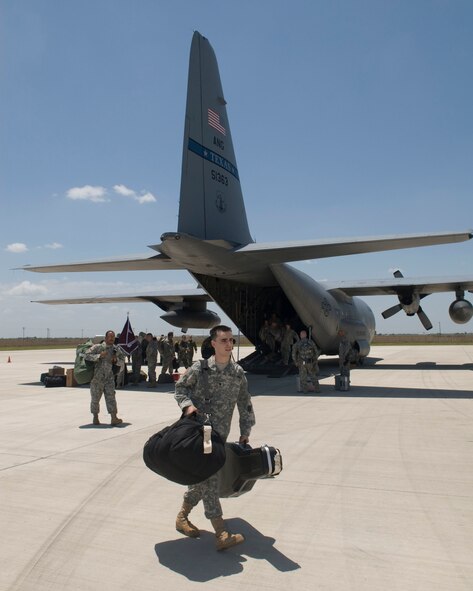 U.S. Army Specialist. Birdwell and other members of the Texas Military Forces arrive at Valley International Airport, Harlingen, Texas flown by the 136 AW, Texas Air National Guard from Fort Worth to participate in Operation Lone Star. Operation Lone Star is a joint civilian/military medical mission offering free medical and dental care to the regions in south Texas border towns, 25 July 2009.(USAF Photo by Master Sgt. Michael Lachman)  