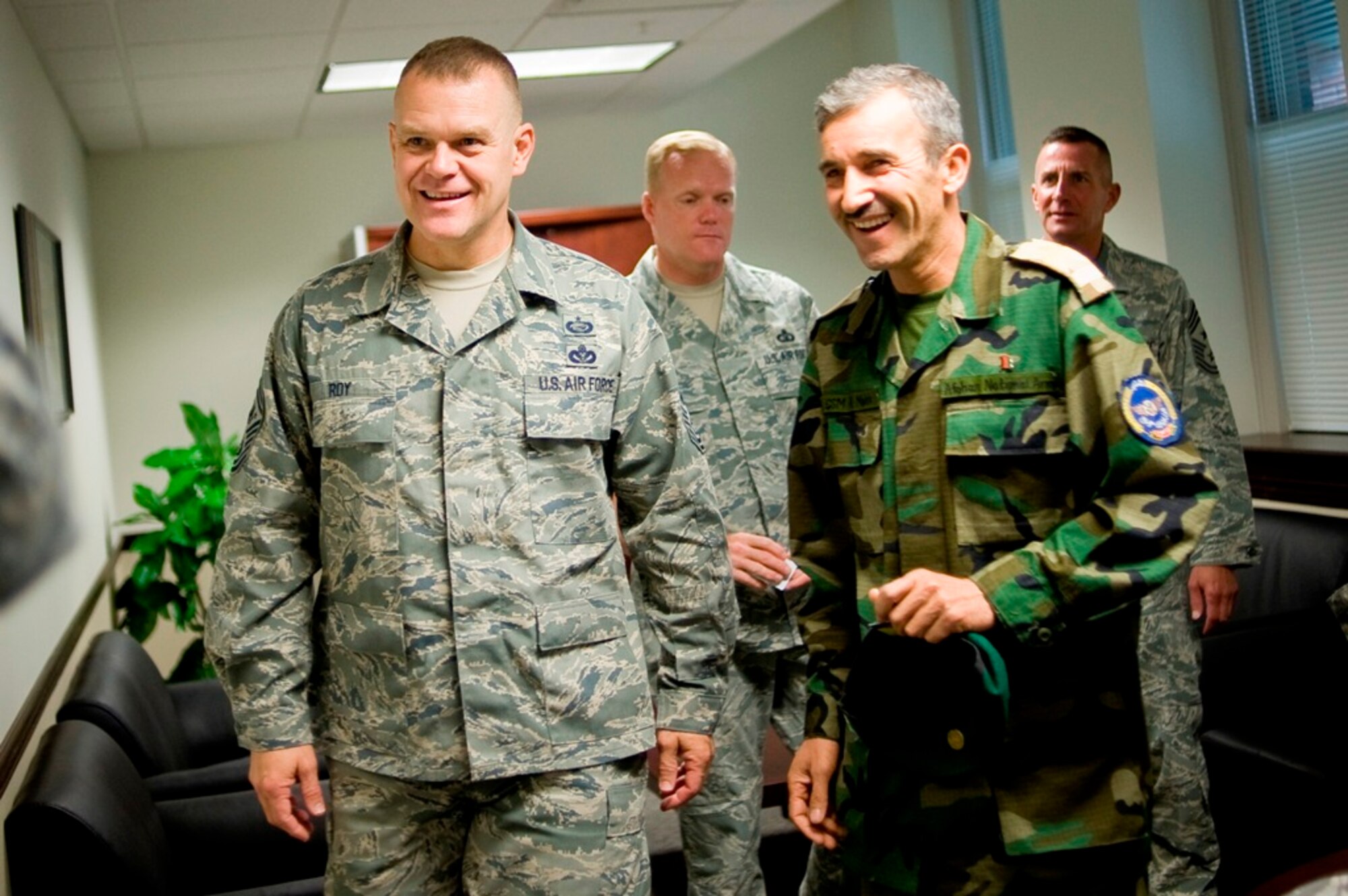 Chief Master Sergeant of the Air Force James A. Roy and Command Sergeant Major of the Afghan Air Corps Abdul Malik, the top enlisted members of their respective services, meet during Air Mobility RODEO 2009, at McChord Air Force Base, Wash., July 23. RODEO is an international combat skills and flying operations competition designed to develop and improve techniques and procedures with our international partners to enhance mobility operations.  Afghanistan was among the international participants during the week-long event.  (U.S. Air Force photo/Abner Guzman)