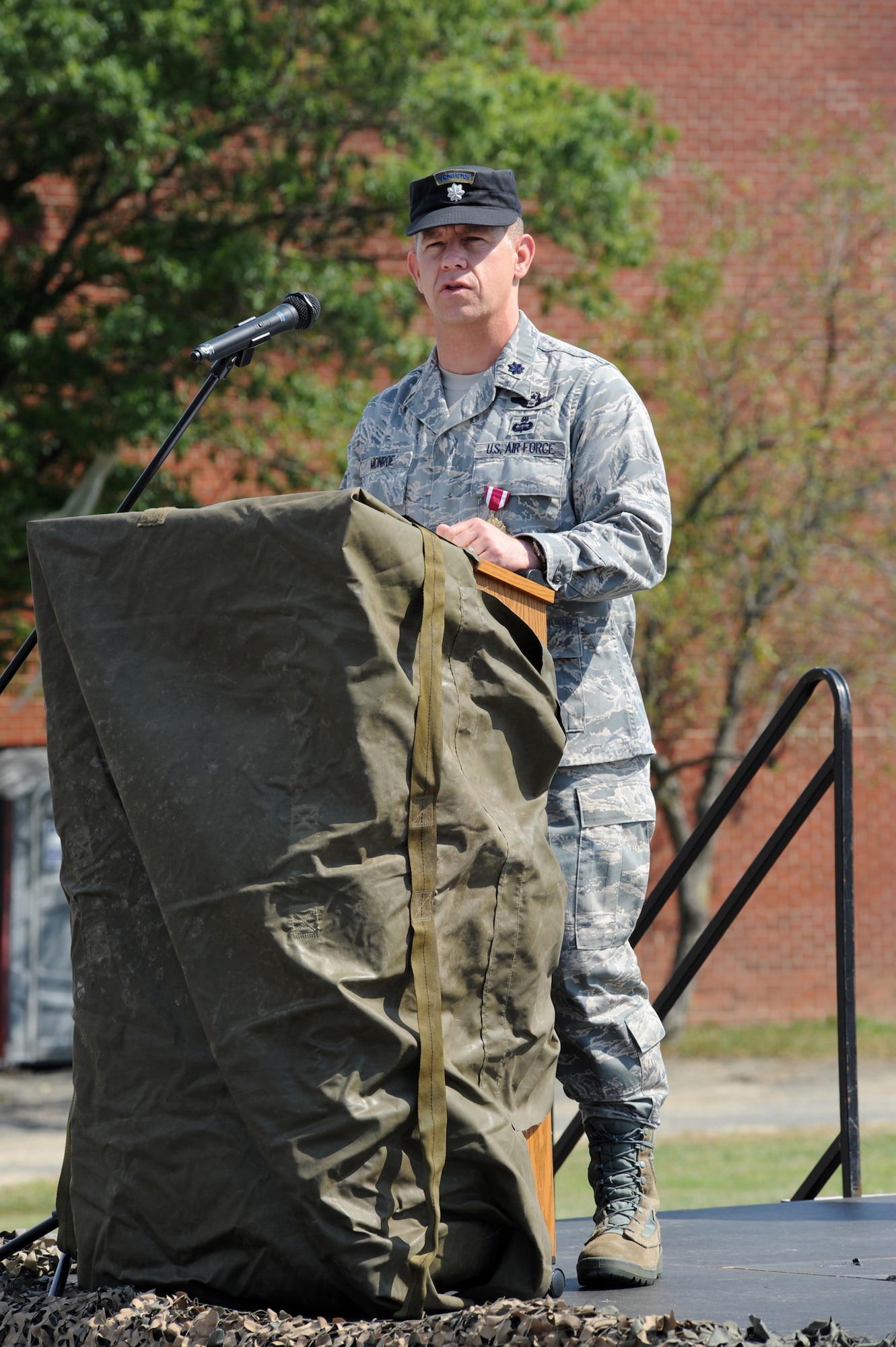 Lt. Col. Mitchell Monroe, 421st Combat Training Squadron commander, gives a final speech July 13 during his change of command ceremony at Joint Base McGuire-Dix-Lakehurst, N.J.  Lt. Col. David Lenderman will assume command of the 421st CTS housed at the U.S. Air Force Expeditionary Center on Fort Dix. (U.S. Air Force Photo/Staff Sgt. Nathan G. Bevier) 