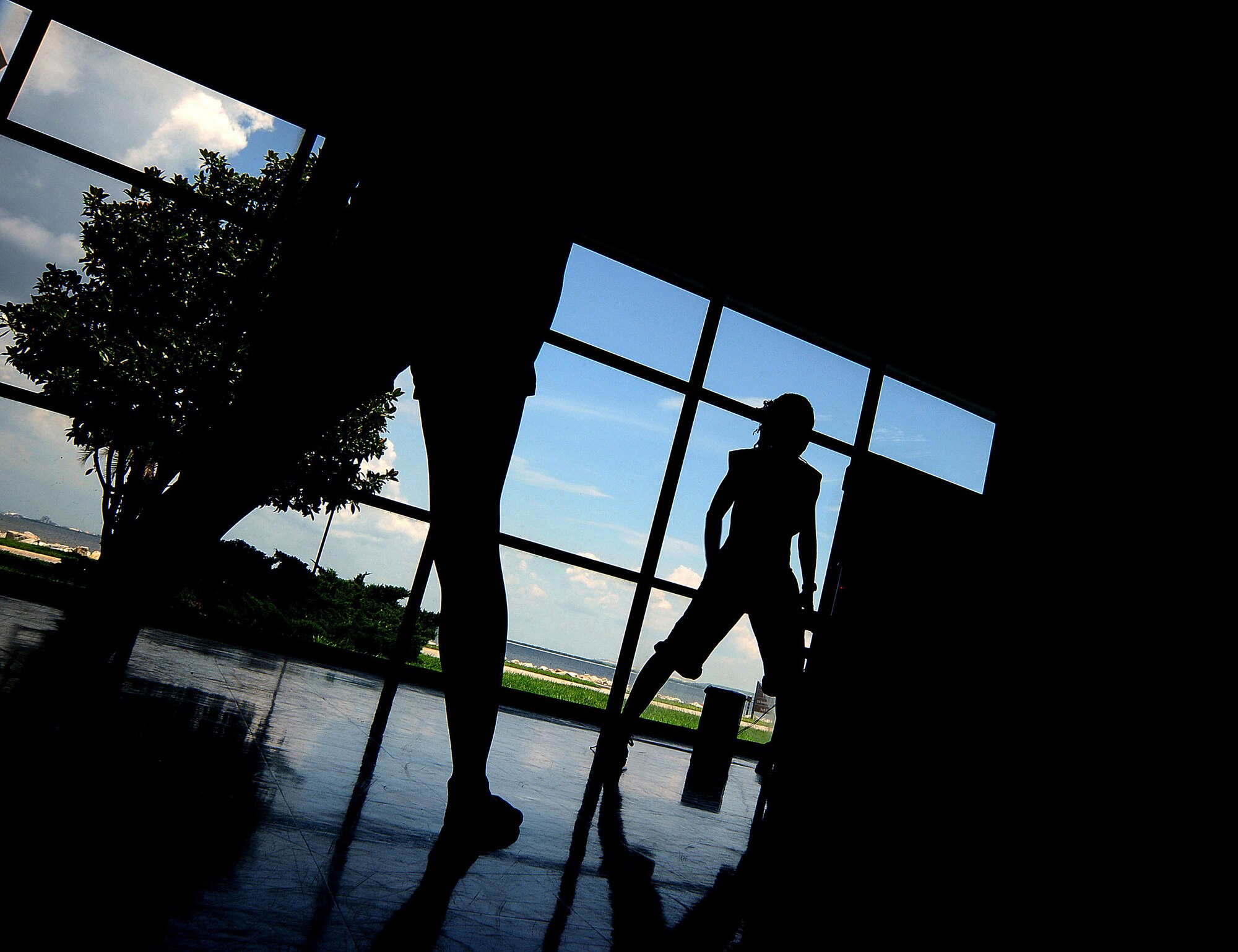 Youth from the MacDill AFB Youth Center Dance Team practice dance routines and moves at the youth center on base on July 14, 2009.  Members from the team consist of military dependants and meet regularly to enhance their dancing skills. (U.S. Air Force Photo by Airman 1st Class Rylan Albright)