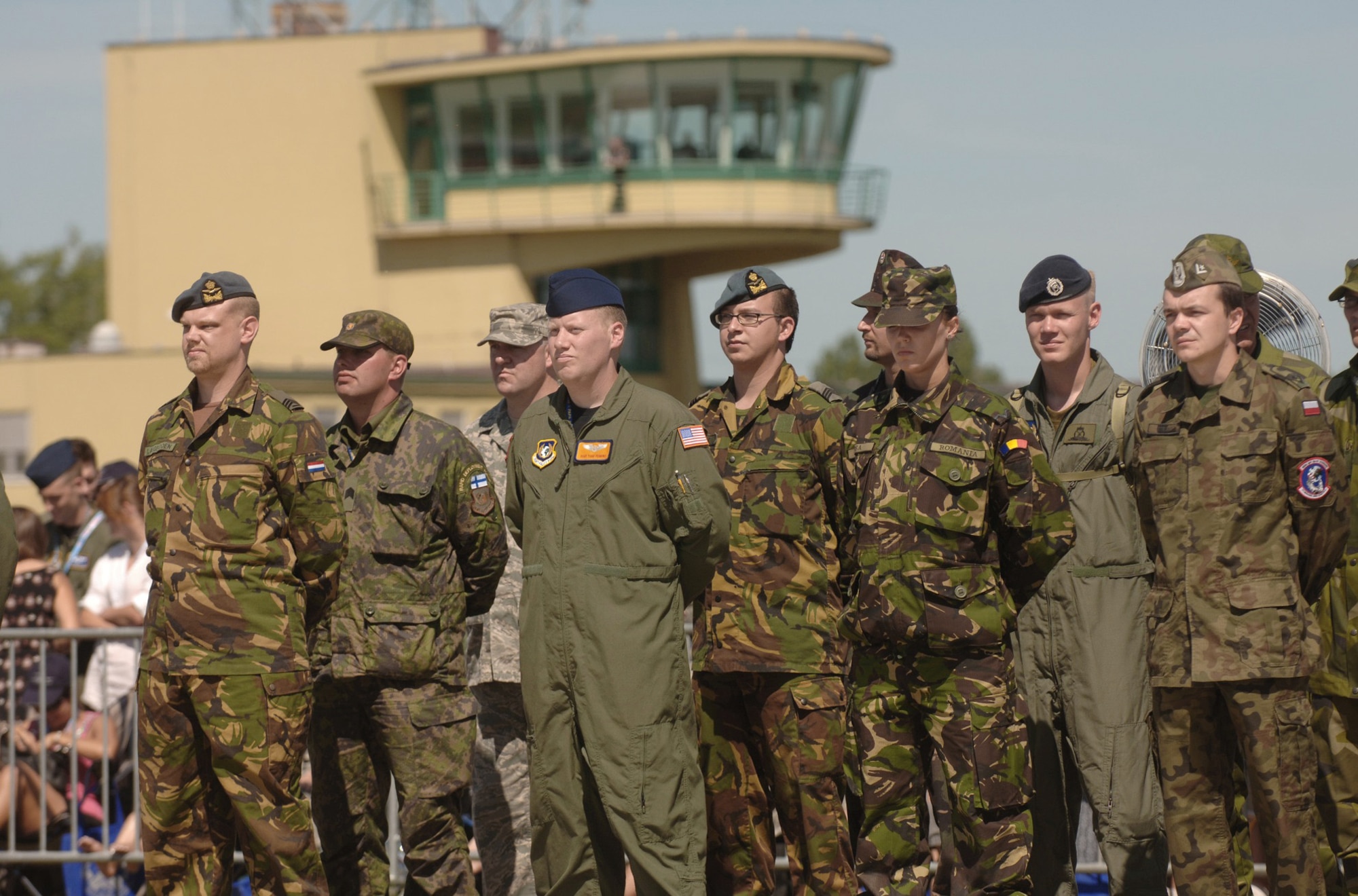 Airmen representing the 12 partnering nations take part in the activation ceremony of a first-of-its-kind multinational Heavy Airlift Wing at Papa Air Base, Hungary. The ceremony celebrated the efforts of the 12 nations who, during the last 10 months, stood up the organization that will provide strategic airlift worldwide for humanitarian, disaster relief, and peacekeeping missions in support of the European Union, United Nations and NATO. (U.S. Air Force photo/Master Sgt. Scott Wagers)