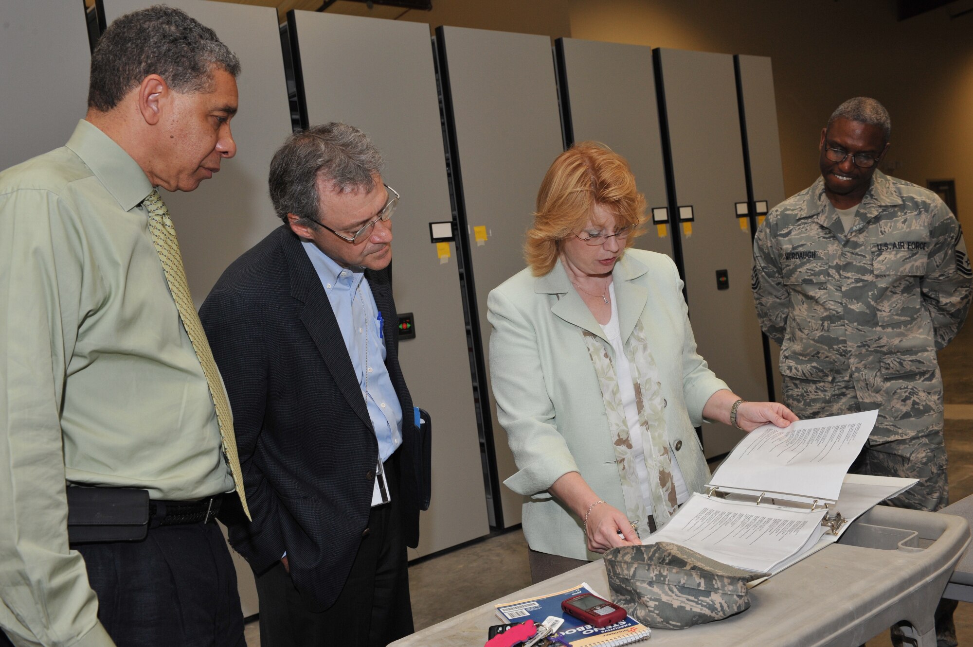 SHAW AIR FORCE BASE, S.C.--  (left to right)  Jerry Phillips, ACC command records manager; Rich Noble, archives specialist, NARA; Penny Sayle, Air Force records officer; and Senior Master Sgt. Darin Murdaugh, USAFCENT 3A functional manager visit a recently renovated war record storage facility here, July 1. (U.S. Air Force Photo/Tech. Sgt. Josef Cole)