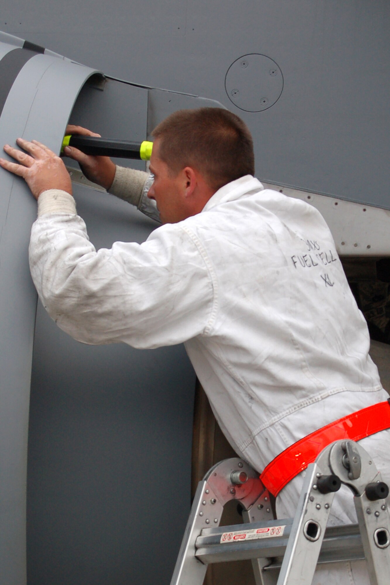 Staff Sgt. Kevin McPherson, 319th Aircraft Maintenance Squadron, thoroughly inspects an engine on a KC-135 during the 2009 Air Mobility RODEO competition July 23 in preparation for the umpires' scrutiny.  (U.S. Air Force photo/Tech. Sgt. Amanda Callahan)