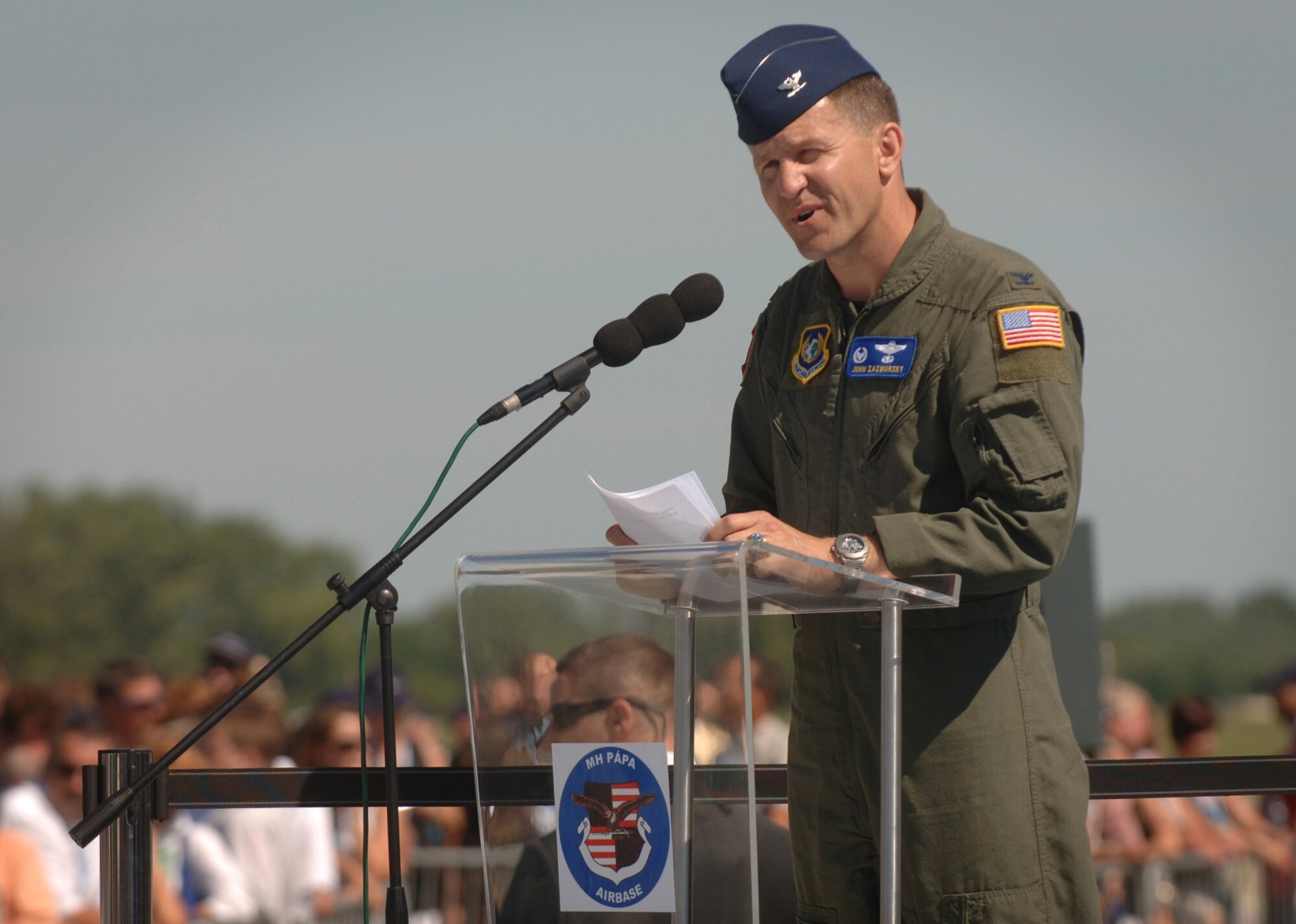 PAPA AIR BASE, Hungary--During the official activation ceremony of a first-of-its-kind multinational Heavy Airlift Wing at Papa Air Base, Hungary, on July 27, U.S. Air Force Col. John Zazworsky gives thanks to the 12 nations who, over the last 10 months, stood up the organization that will provide strategic airlift worldwide for humanitarian, disaster relief, and peacekeeping missions in support of the European Union, United Nations and NATO. (Department of Defense photo/ Master Sgt. Scott Wagers)