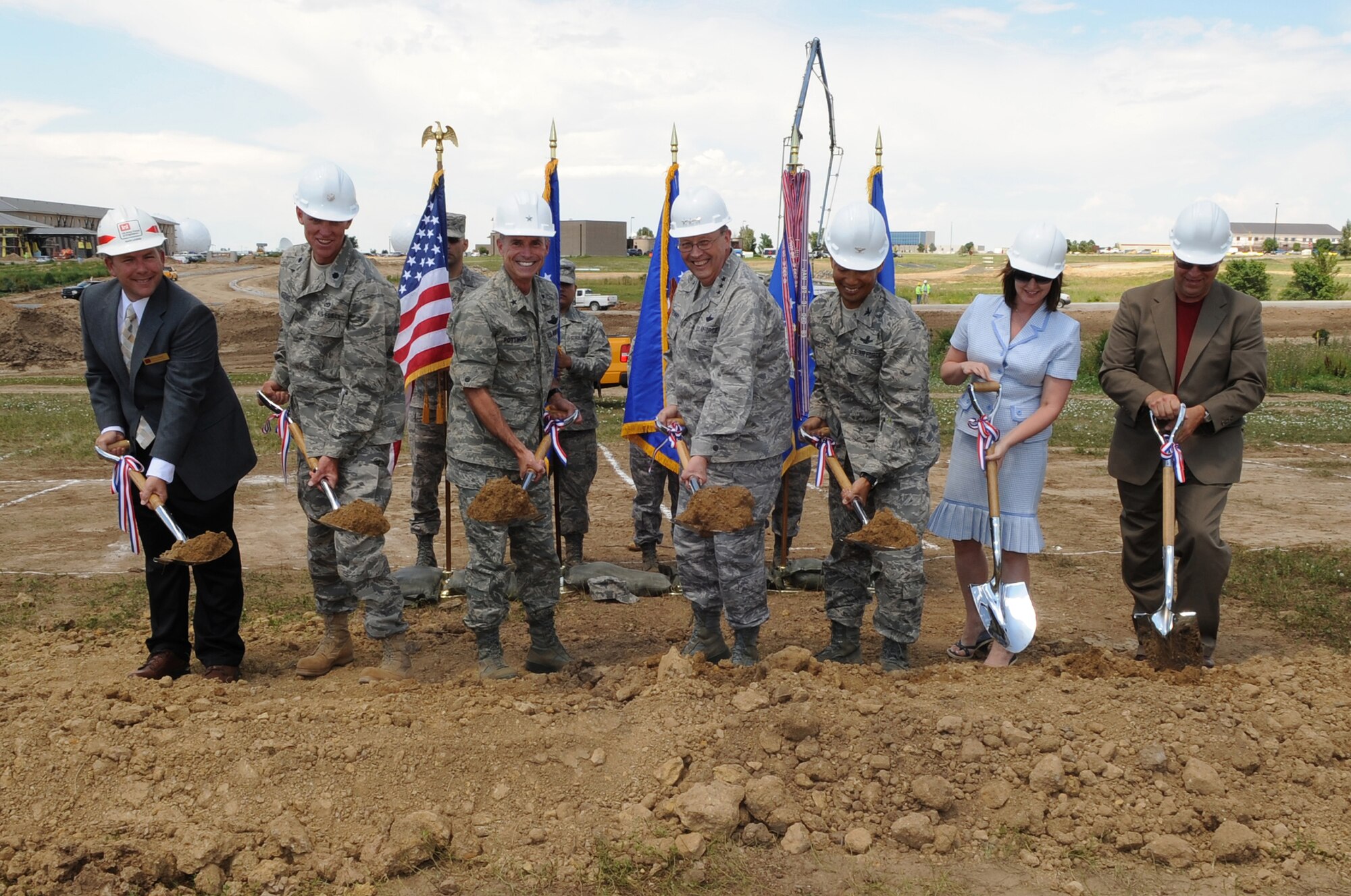 BUCKLEY AIR FORCE BASE, Colo. – Breaking ground on the new Air Force Reserve Personnel Center facility Jul. 24 are (from left to right): Kevin Lindsey, Omaha District Corps of Engineers area engineer; Lt.Col. Thomas Niichel, 460th Civil Engineer Squadron; Brig Gen Kevin Pottinger, Air Force Reserve Personnel Center commander; Lt. Gen. Charles Stenner, commander of Air Force Reserve Command; Col. Ariel Barredo, 460th Space Wing individual mobility augmentee; Lisa Tippin, Air Force Reserve Personnel Center project manager and lead for design team structure, Frankfurt-Short-Bruza Associates, and Kenneth Anderson, vice president of FourFront Design. The new $17 million ARPC building should be completed by 2011. (U.S. Air Force photo by Senior Airman John Easterling)