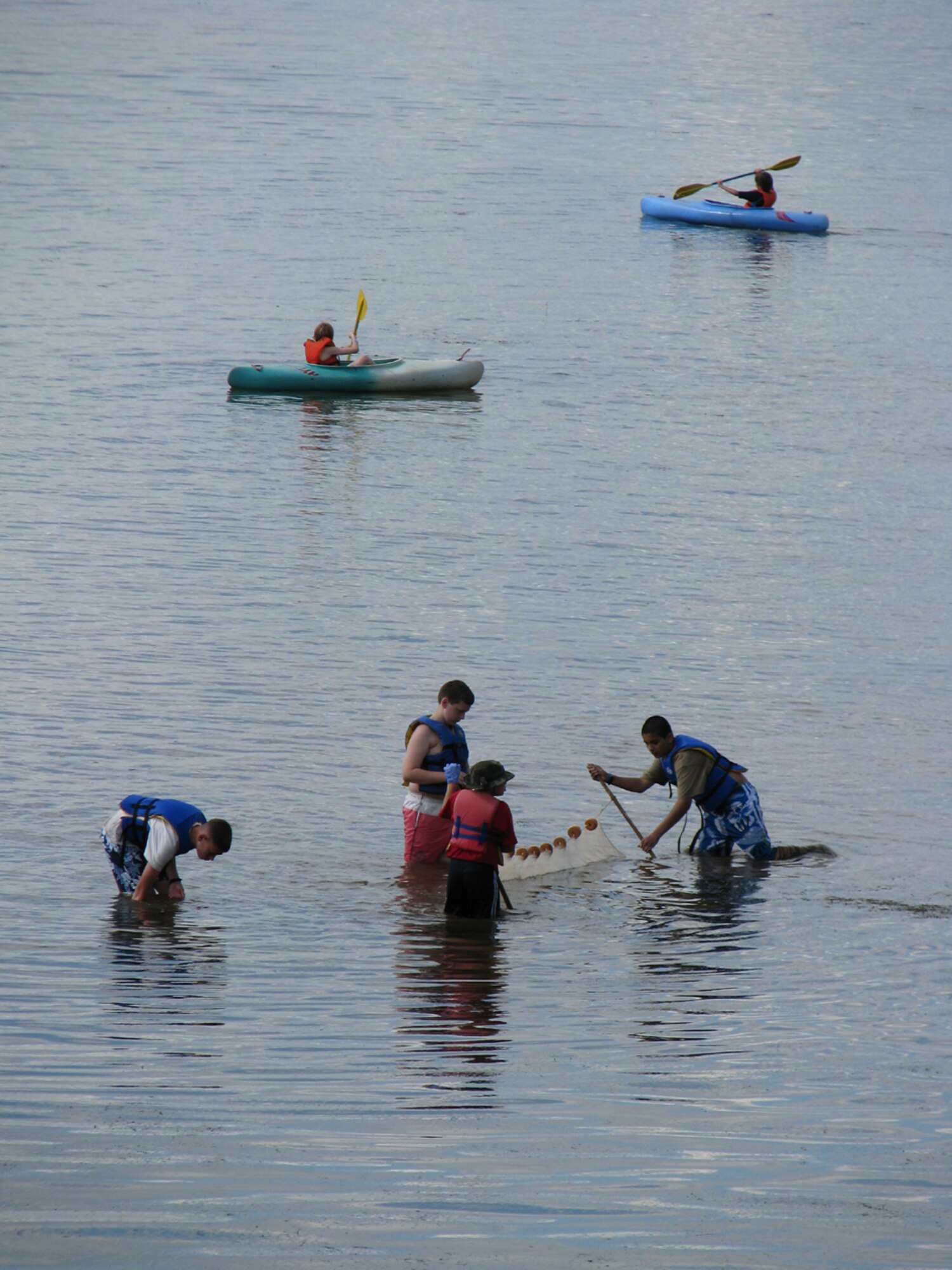 Scouts from Boy Scout Troop 18, based out of McGuire Air Force Base, N.J., fish and canoe during a recent summer camp at the Rodney Scout Reservation in Maryland. (Courtesy photo)