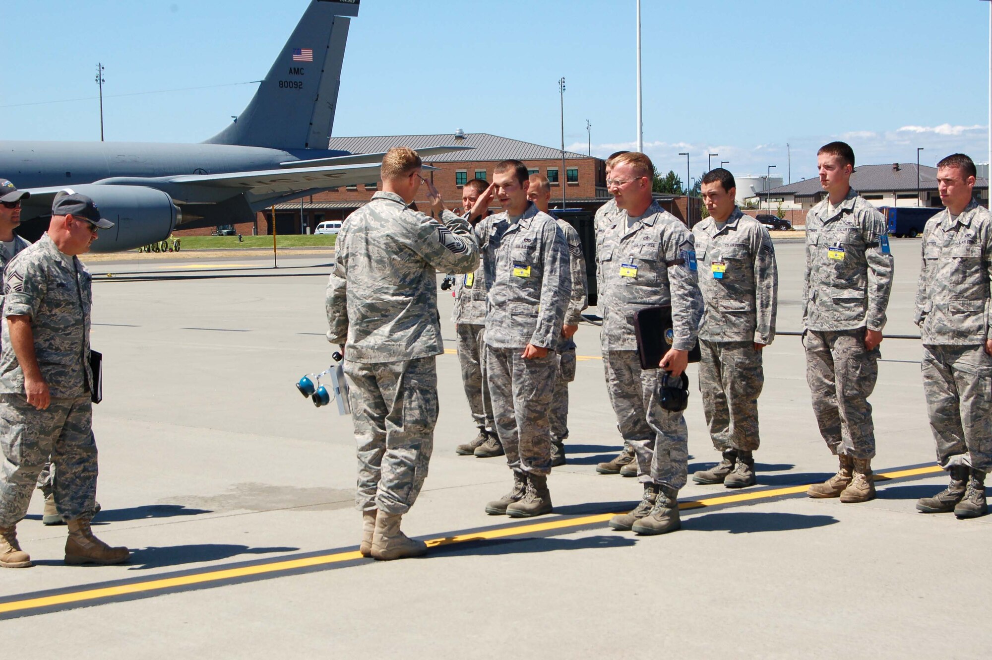 1st Lt. Brandon Rodts, 319th Aircraft Maintenance Squadron, presents the 319th Air Refueling Wing's maintenance team for inspection during the 2009 Air Mobility RODEO at McChord AFB, Wash., July 19. (U.S. Air Force photo/Tech. Sgt. Amanda Callahan)
