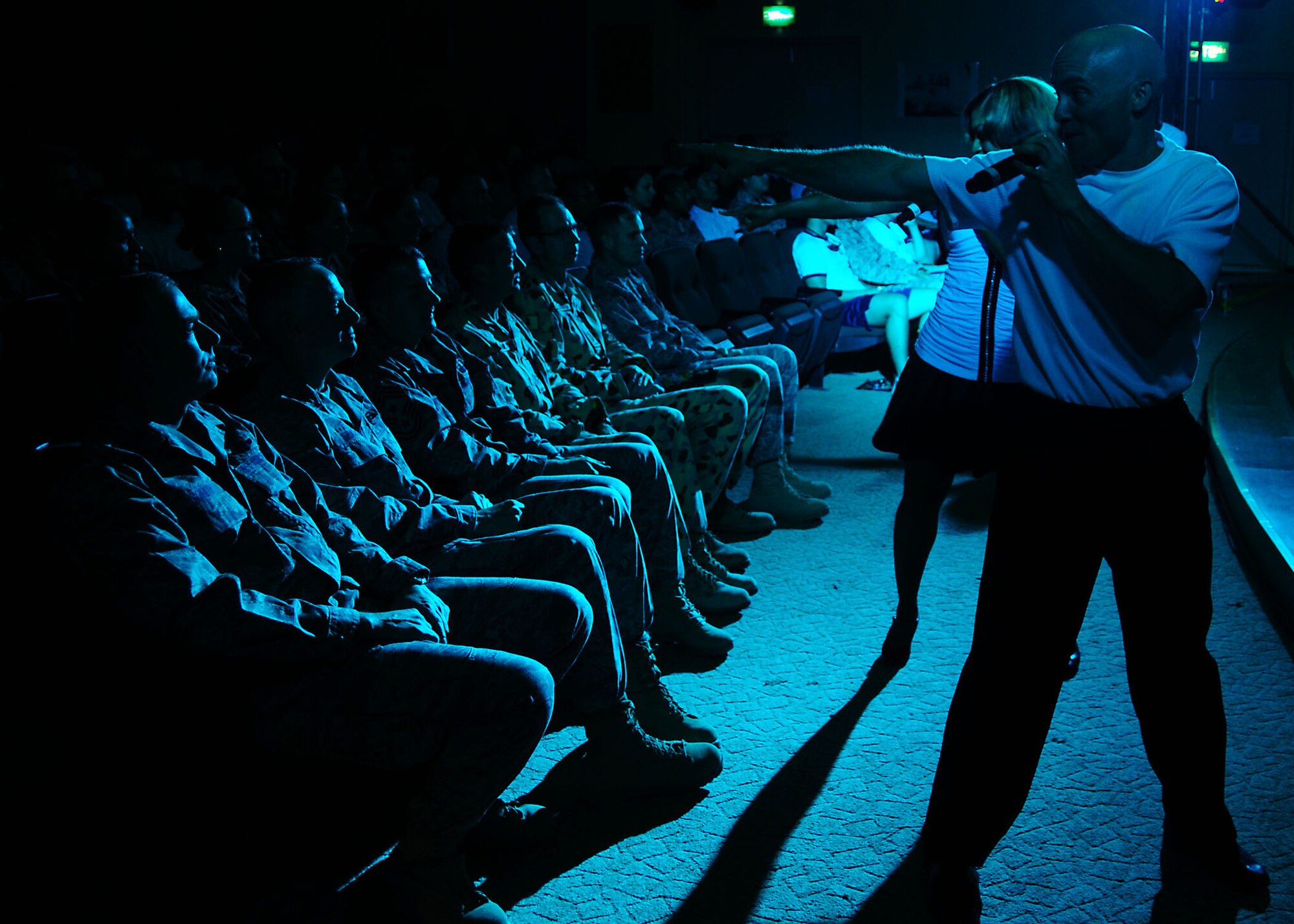 SOUTHWEST ASIA-- Performers of Tops in Blue entertain members of the 386th Air Expeditionary Wing at an undisclosed location in Southwest Asia July 24.  Celebrating more than 56 years of entertainment history, Tops in Blue is proud to represent the U.S. Air Force as one of the oldest and most widely traveled entertainment groups of its kind.  (U.S. Air Force photo/Tech Sgt. Tony Tolley)