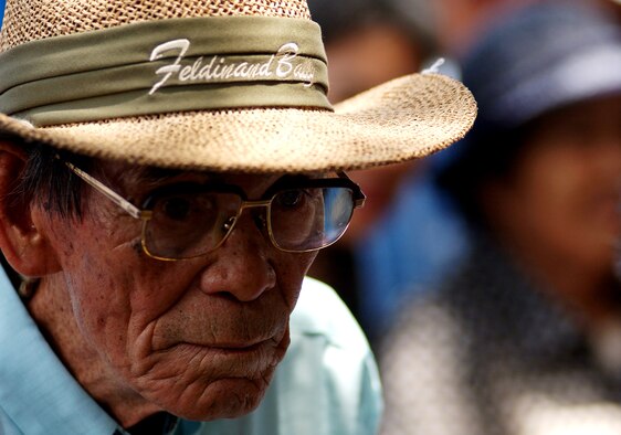 An Okinawan gazes at a monument during his visit to the war-related sites on Kadena Air Base, Japan July 23. Nearly 90 visitors ages 60-90 years old from the Okinawa Prefectural Disabled Veterans Association visited the Peace Garden near the Youth Center and an old aircraft hanger near Gate 3. This group is very unique as they  served in the Imperial Japanese Army during the Battle of Okinawa, sustained  injuries in the war, and have been receiving military pensions from the Government of Japan. They were not directly deployed to Okinawa during the war, but drafted from here to serve in the Army.
(U.S. Air Force photo/Tech. Sgt. Rey Ramon)           