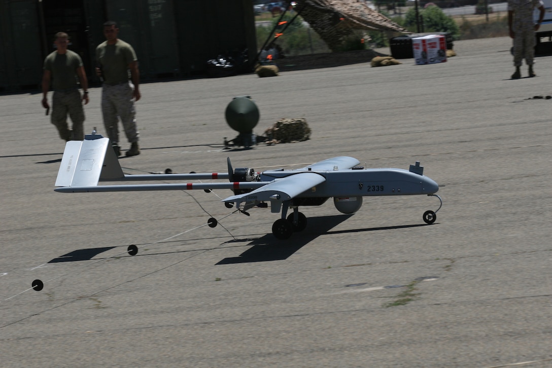 A RQ-7B Shadow 200 beloning to Marine Unmanned Aerial Vehicle Squadron 1, lands after more than two-hours of flight aboard Marine Corps Base Camp Pendleton, July 27. The aircraft has been supporting troops on the ground in both Afghanistan and Iraq.  (Official U.S. Marine Corps photo by Cpl. Christopher O'Quin)(Released)