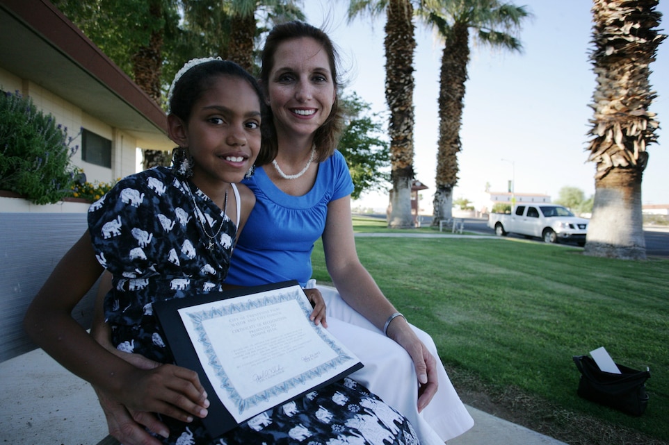TWENTYNINE PALMS, Calif. - Gunnery Sgt. Cheryl J. Hyde, the administration officer for the commanding general's office, and her daughter, Jasmine, received a letter of recognition from Mayor Joel Klink during a City Hall meeting July 28. Jasmine placed in Time Warner Cable's Desert Cities' 25 Best Moms of 2009 Essay Contest out of nearly 1,300 entries from children in grades four to 12.