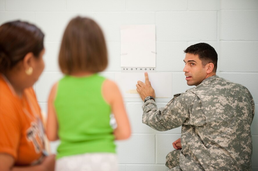 Army National Guard Sgt. Alan Funk from Austin, Texas Medical Command performs free vision screening for local residents  during Operation Lone Star at the Raymondville Medical Innovative Readiness Training Team Site, July 28, 2009. (U.S. Air Force photo by Tech Sgt Charles Hatton)