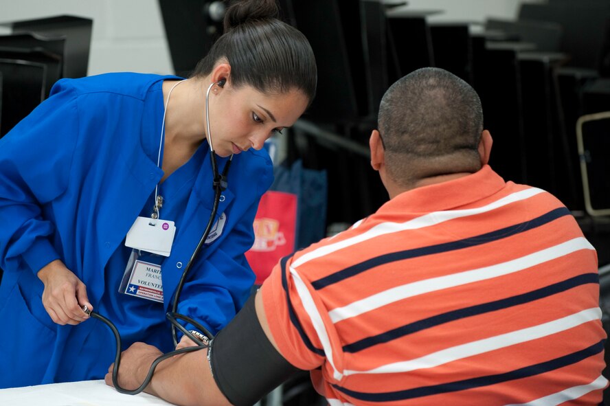 Maritza Franco from South Texas College nursing program volunteers her time to triage residents during Operation Lone Star held at Raymondville High School July 27, 2009. Operation Lone Star is a joint operation with military and civilian health services. (U.S. Air Force photo by  Tech Sgt. Charles Hatton)