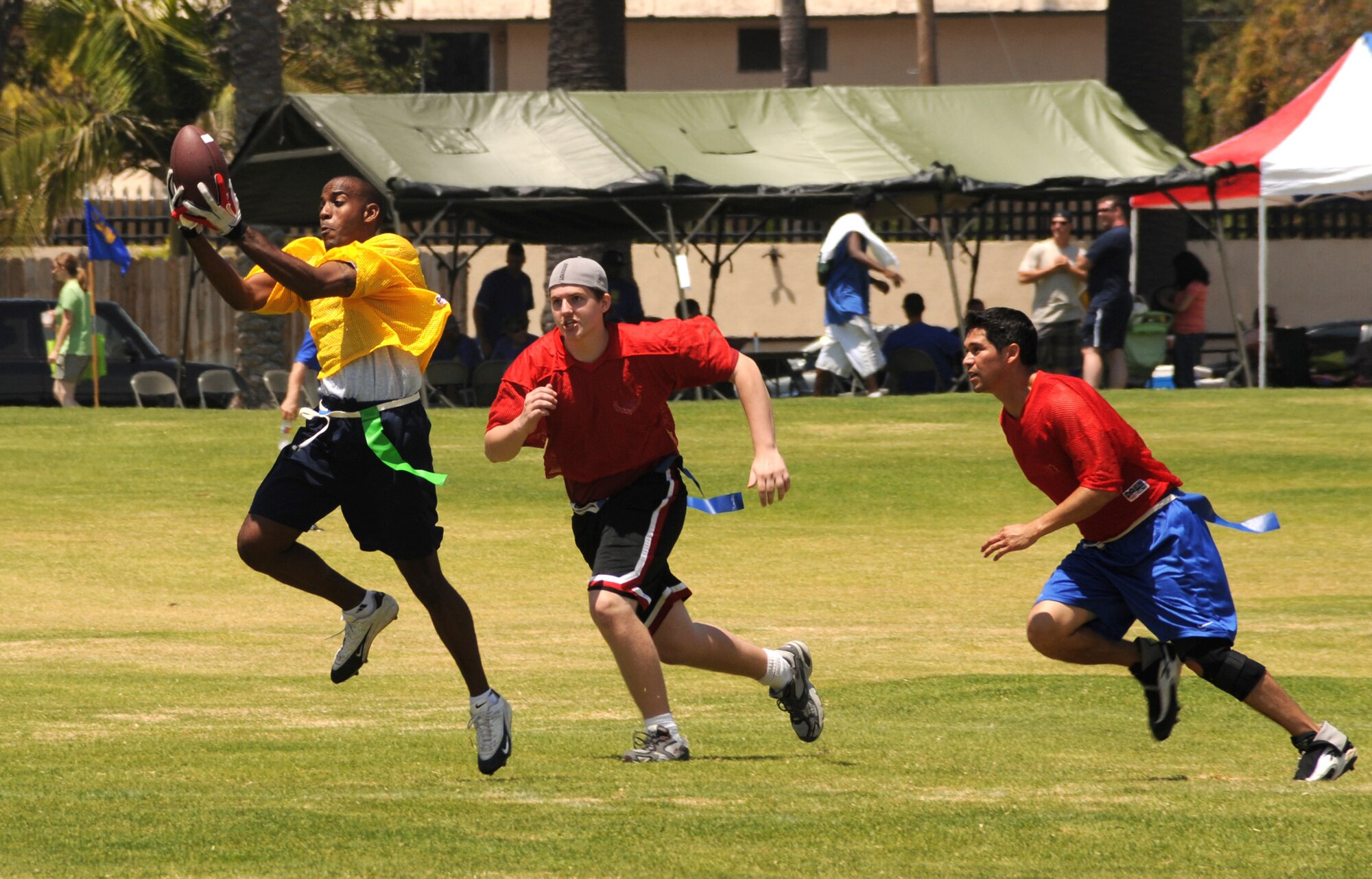Flag football was one of many events at SMC Sports Day, July 24. The 61st Air Base Wing took this year's overall team title.  (Photo by Joe Juarez)