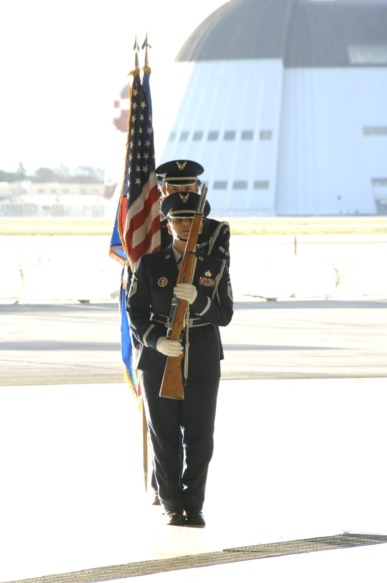 Base honor guard members from the 129th Rescue Wing, Moffett Federal Airfield, Calif., perform at a retirement ceremony at Moffett Field Feb. 7, 2009. (Air National Guard photo by Master Sgt. Dan Kacir)(RELEASED)